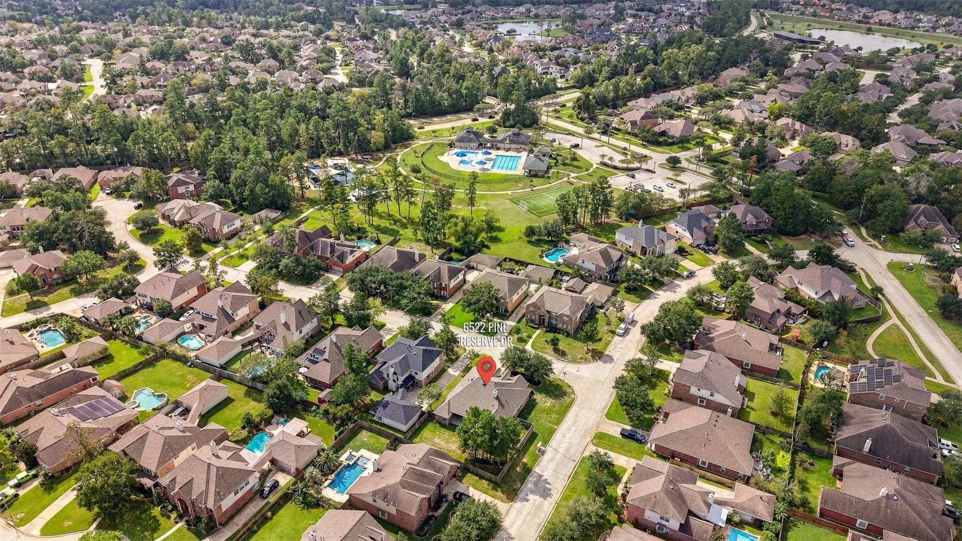 6522 Pine Reserve Drive, Spring, TX 77389 Breathtaking aerial views of a vibrant neighborhood, showcasing lush greenery and a welcoming community atmosphere.