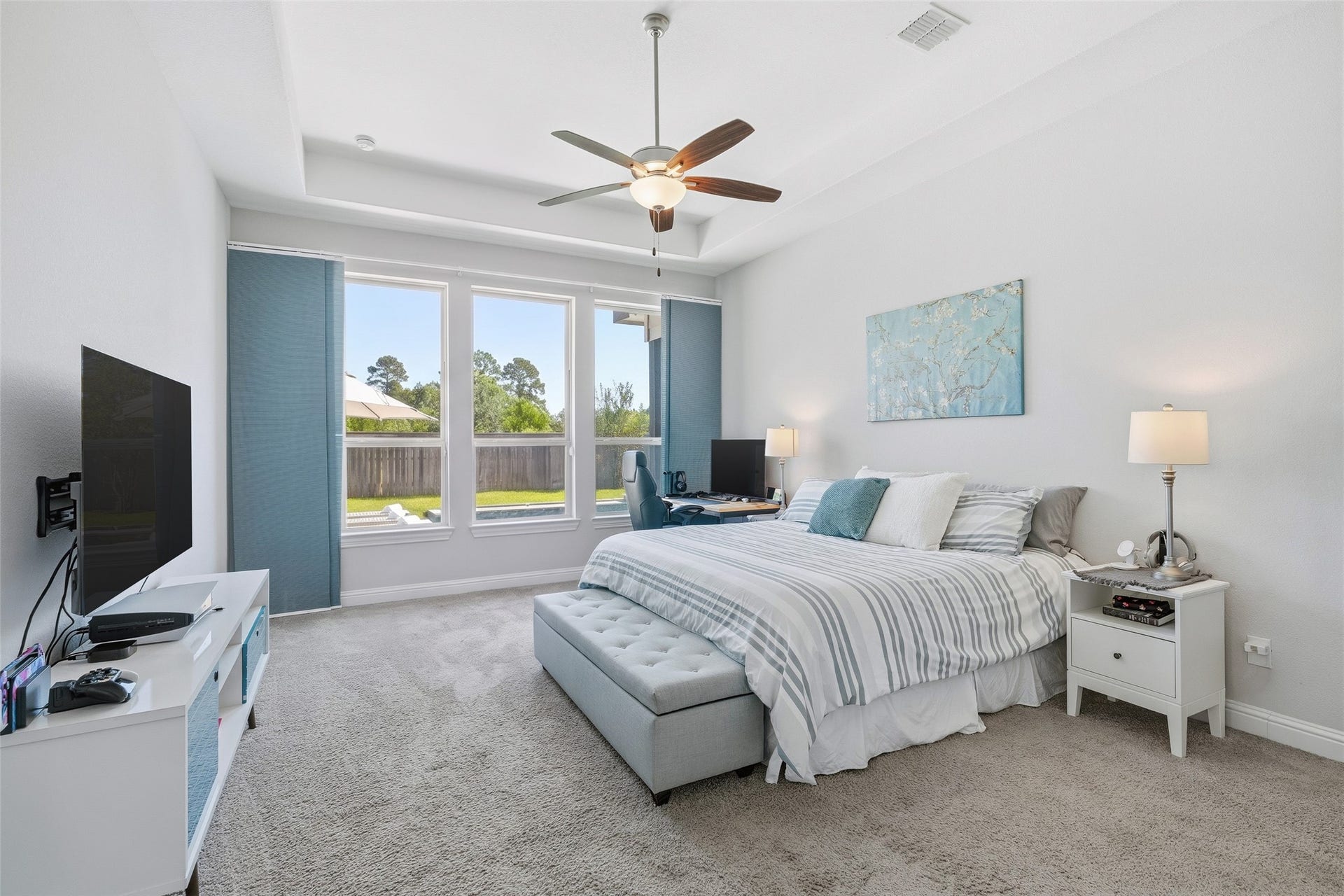 The spacious and private owner's suite on first floor overlooks the pool.
