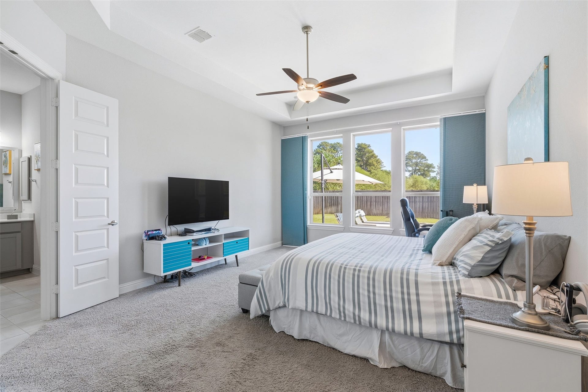 The spacious and private owner's suite on first floor overlooks the pool.