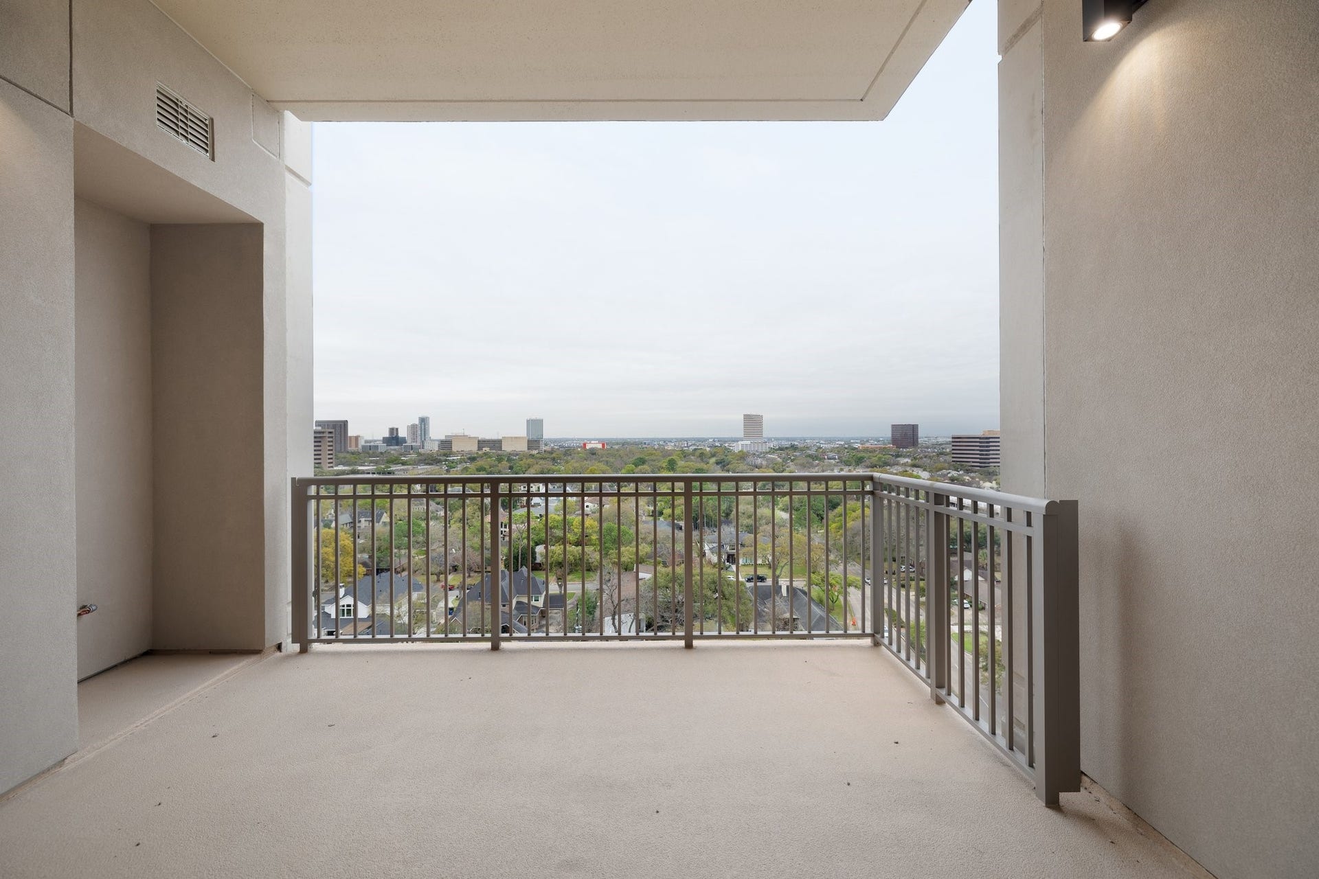 5656 San Felipe Street, #1403, Houston, TX 77056 Step out onto your private covered balcony, spacious enough for lounging or dining. Photos are of a similar unit with the same floor plan