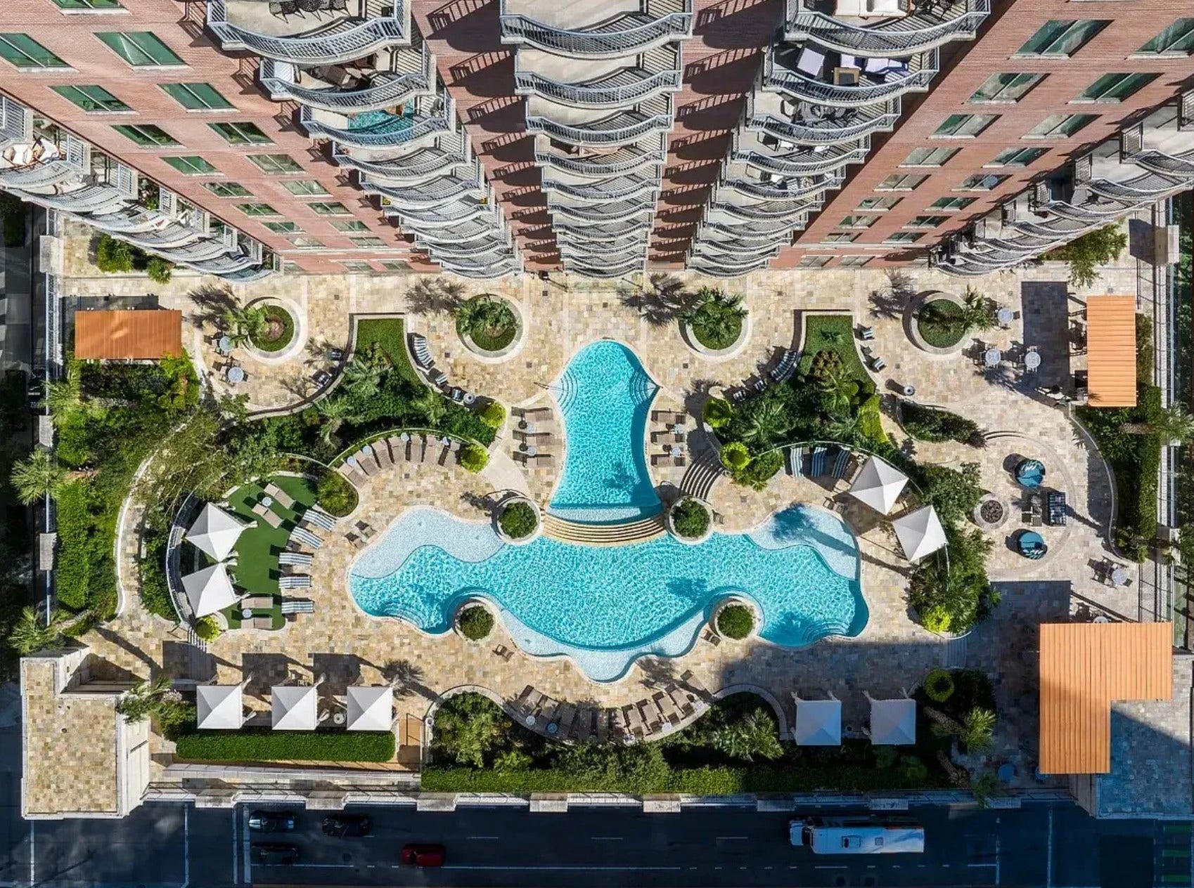 1400 McKinney Street, #1303, Houston, TX 77010 From above, the resort-style pool deck showcases an impressive outdoor oasis thoughtfully designed for relaxation and recreation. Surrounded by lush landscaping, private cabanas, outdoor kitchen, lounge areas and elegant gathering spaces, it offers an upscale atmosphere reminiscent of a luxury resort experience.