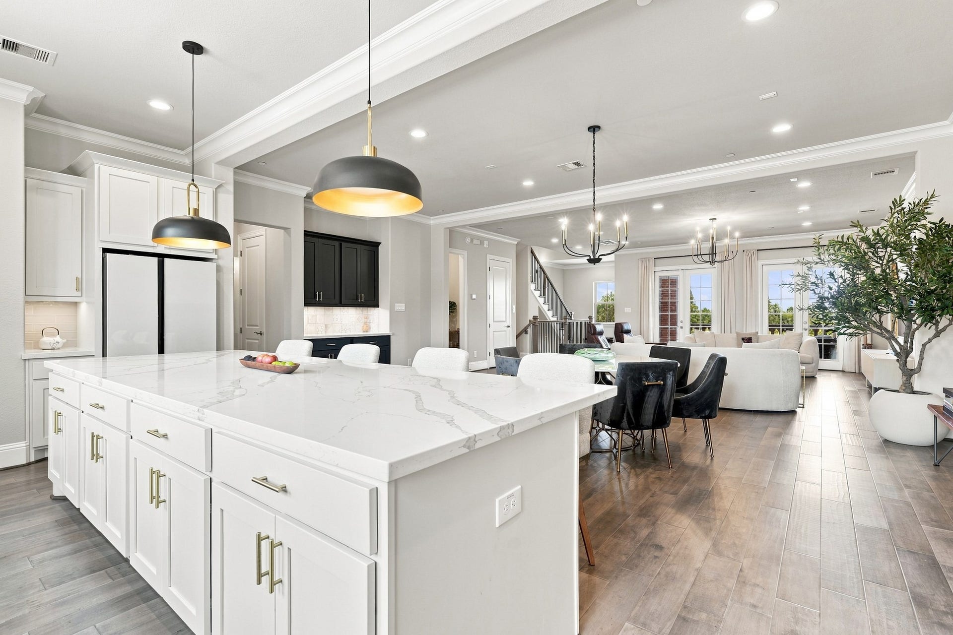 183 Grace Point Drive, Sugar Land, TX 77498 Beautiful picture of the 3 spaces including the bar area and wine room