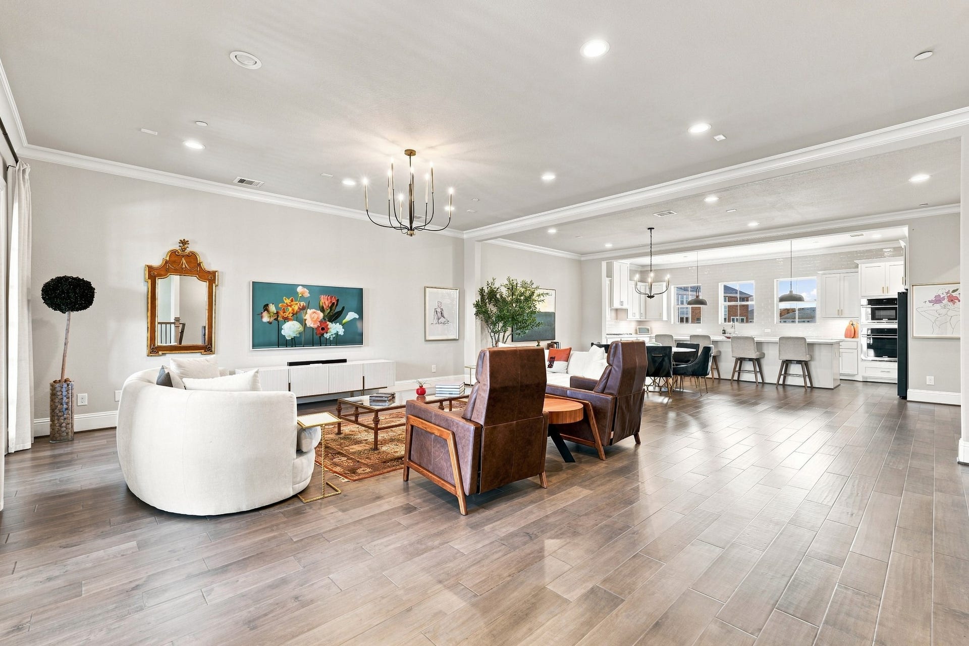 183 Grace Point Drive, Sugar Land, TX 77498 Stunning expansive open-concept living space seamlessly combines the family room, dining area and gourmet kitchen