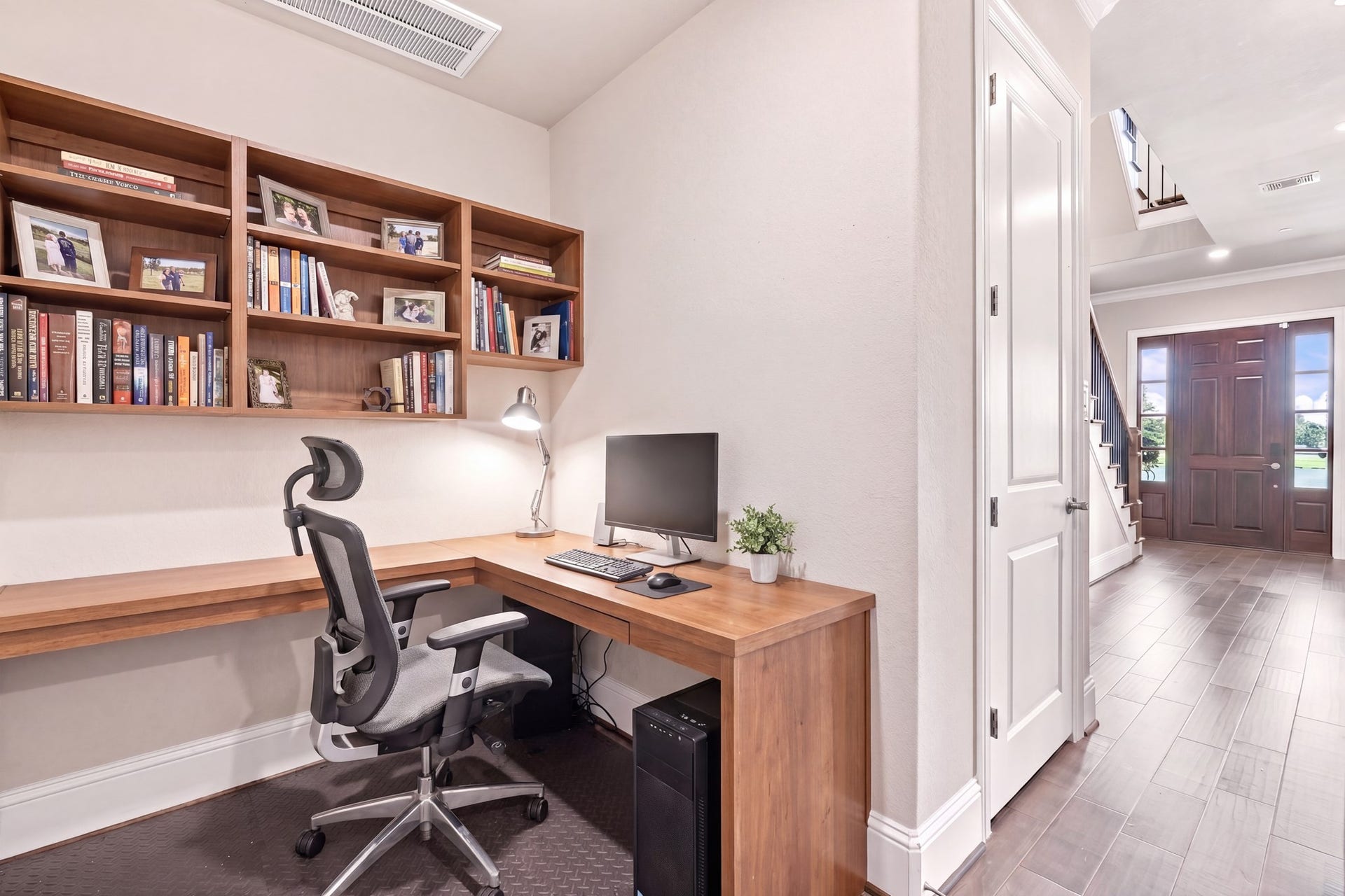 183 Grace Point Drive, Sugar Land, TX 77498 Office nook is virtually staged and could be easily done. Remember there is a private elevator and a 3 car garage with an EV charger!