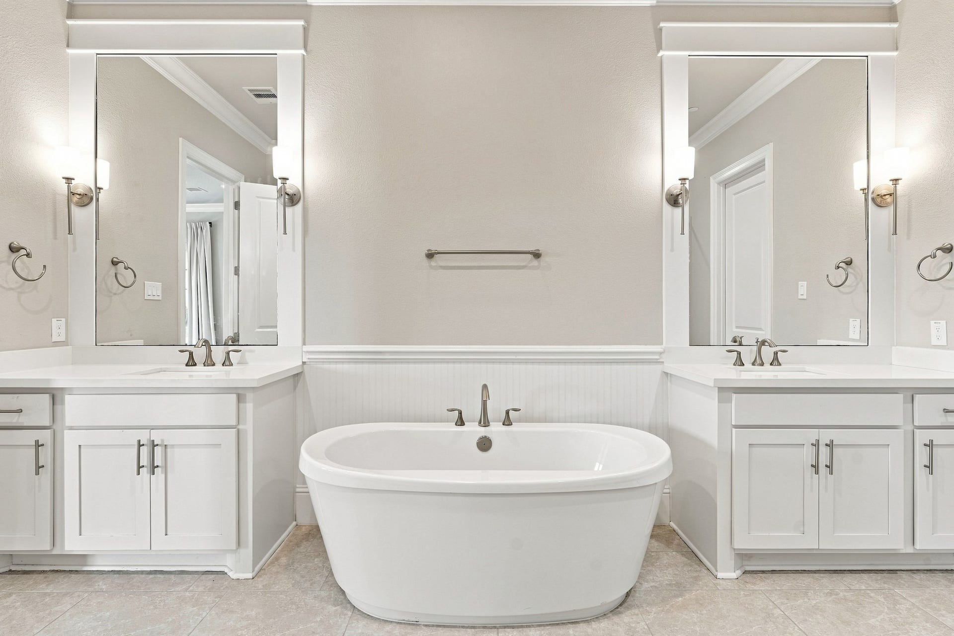 183 Grace Point Drive, Sugar Land, TX 77498 Primary Bathroom with 2 walk in closets, soaking tub, dual dressing areas and an oversized shower