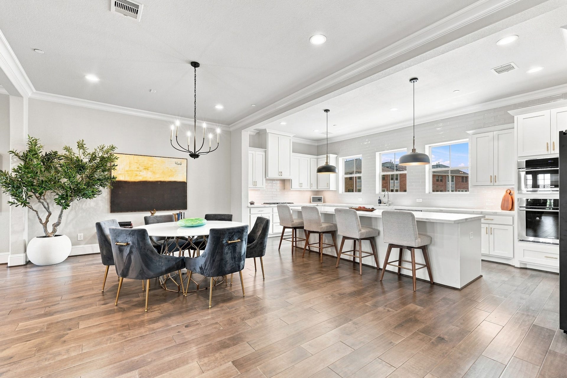 183 Grace Point Drive, Sugar Land, TX 77498 This open dining and kitchen area is designed for everyday living and entertaining
