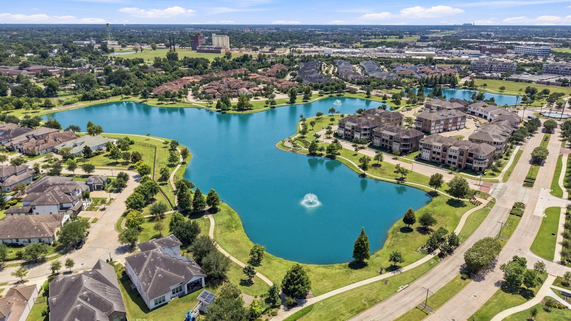 183 Grace Point Drive, Sugar Land, TX 77498 Amazing view of the lake and fountain which can be seen on all 3 balconies