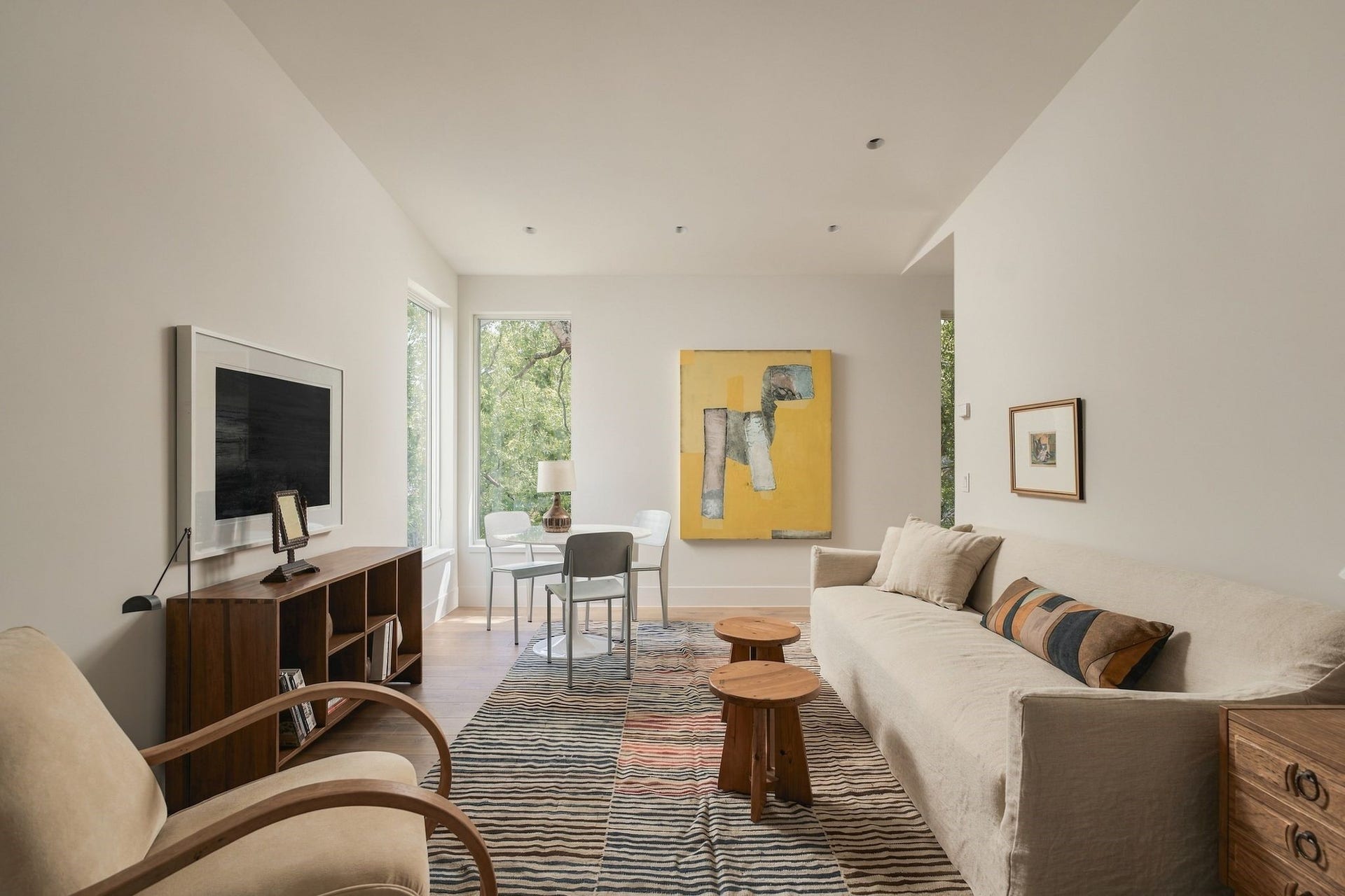 French doors open to a tucked-away upstairs flex space offering endless possibilities as a second study, home gym, playroom or creative space. Privately positioned off the main circulation areas, it provides a quiet retreat while remaining convenient to the bedroom level.