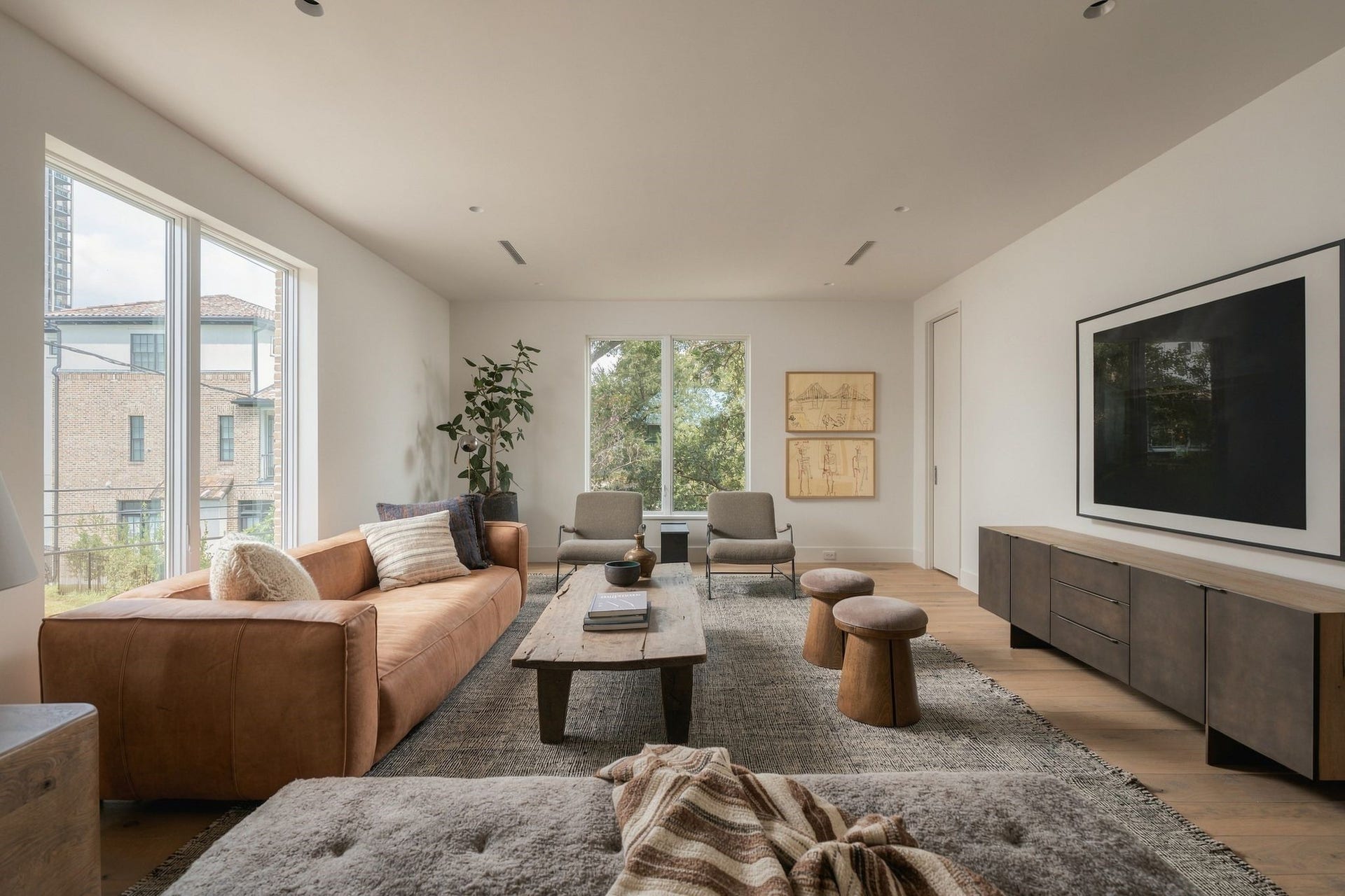 Another view of the generous upstairs game room, offering flexibility for a media area, play space or secondary lounge. Its central location upstairs creates a natural gathering space convenient to the homes bedroom suites.