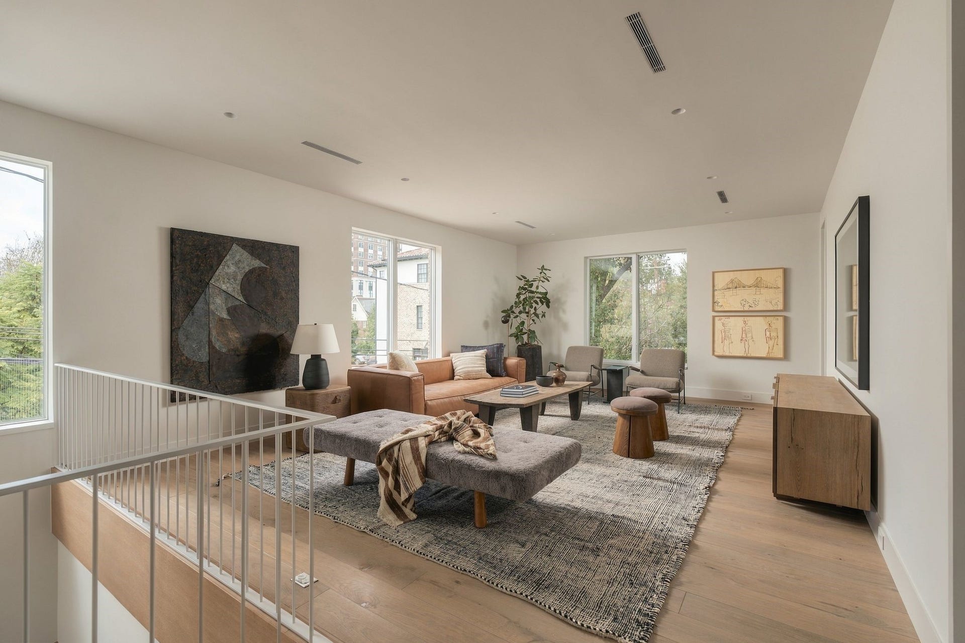 Spacious second-floor game room offers a versatile additional living area tucked away from the main entertaining spaces. A pocket door provides access to a walk-up attic w/ample storage, making this an ideal space for lounging, play or casual entertaining.