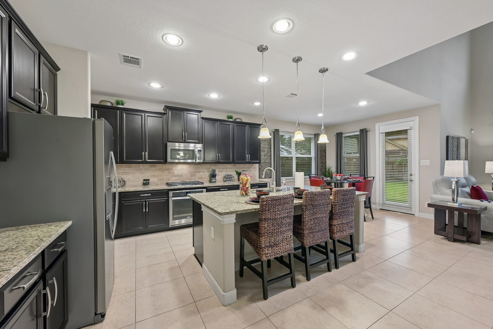 17105 Stillhouse Lake Court, Houston, TX 77044 Well appointed eat-in kitchen. The refrigerator stays!