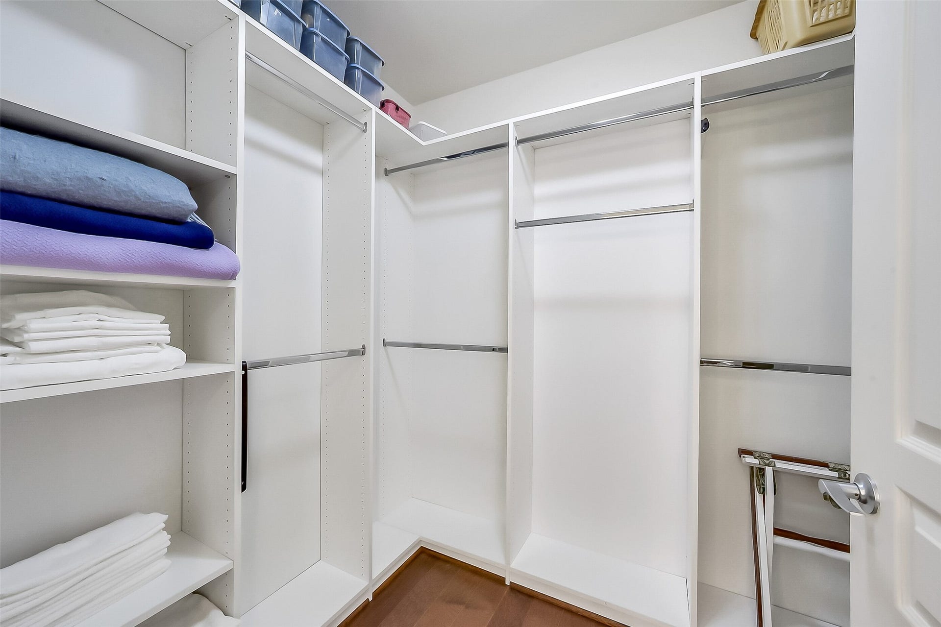3333 Allen Parkway, #710, Houston, TX 77019 California Closets redesigend the spacious walk-in-closet of the primary suite.