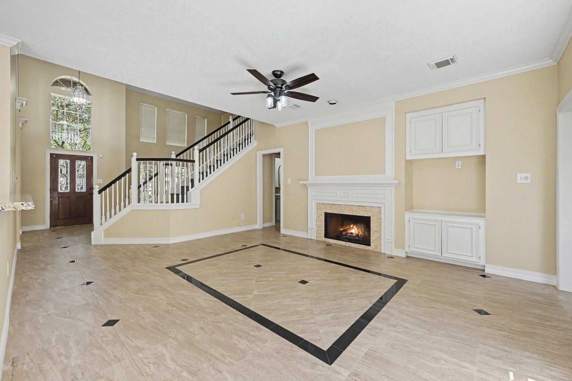 2814 Sanctuary Cove, Katy, TX 77450 Family room with gas fireplace and opens to the kitchen