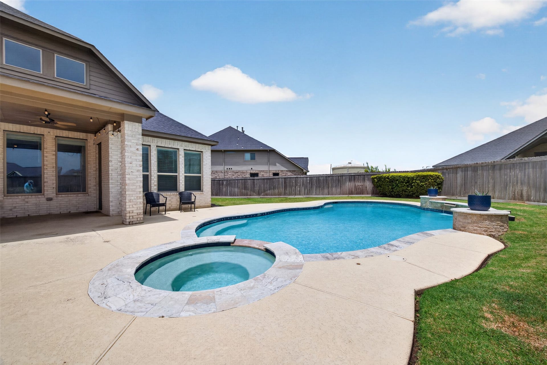 Pool is heated, features waterfalls and lighting. The perfect way to spend the summer!