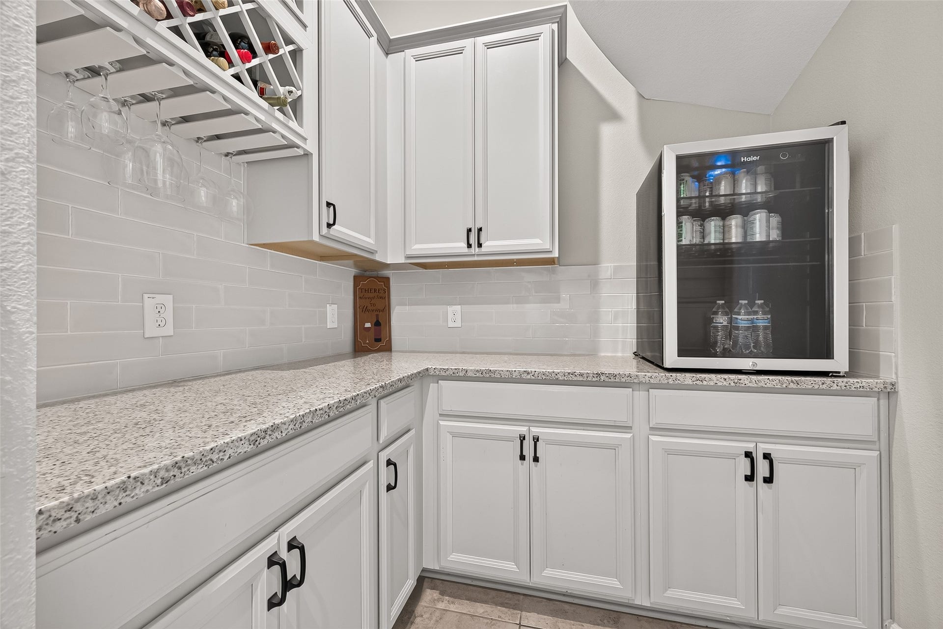 Entertainer's dream space with additional cabinets.