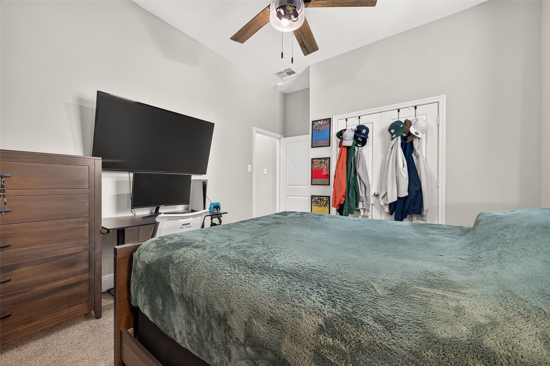 This bedroom has easy access to the full bath and game room.