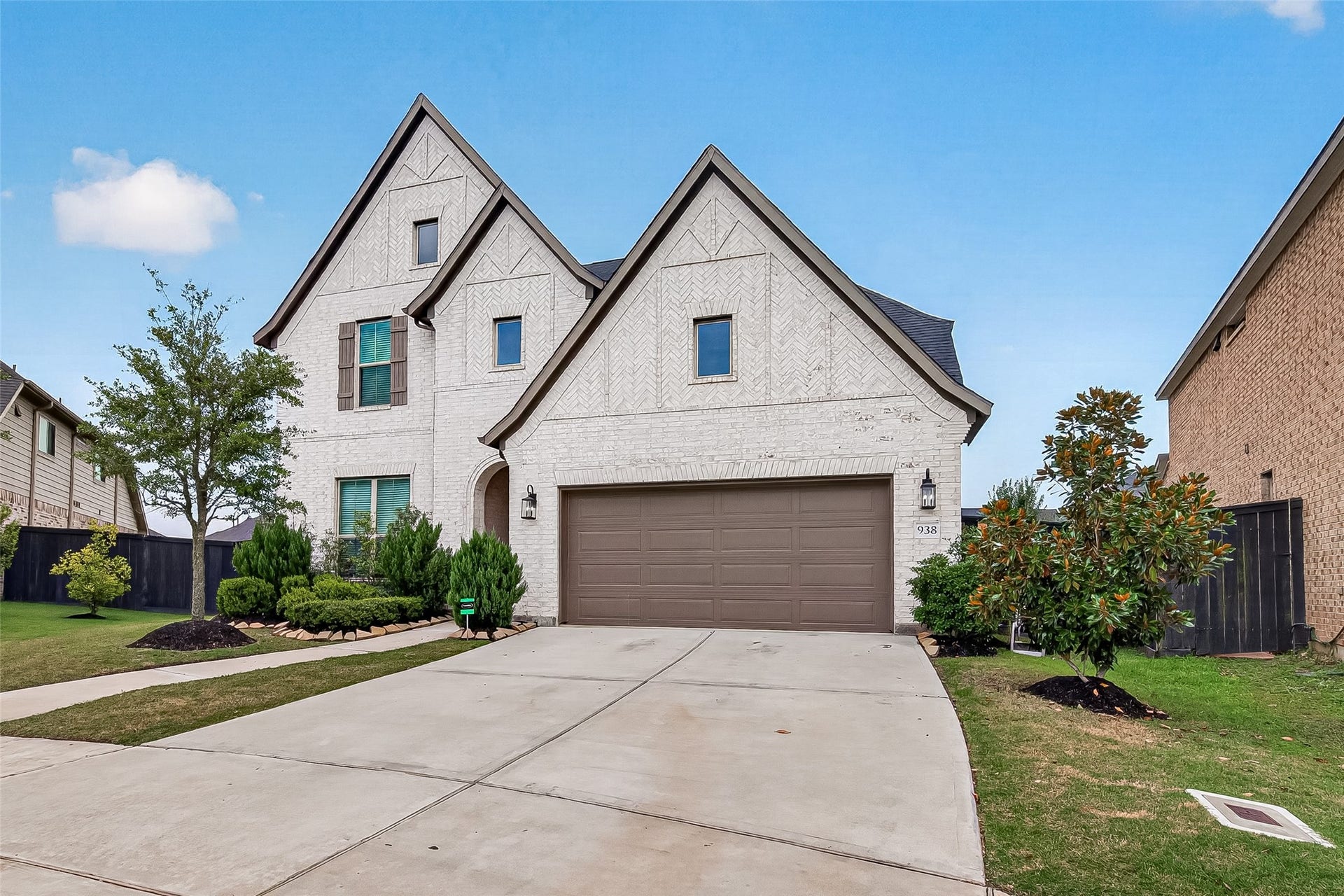 Two car garage and double wide driveway.