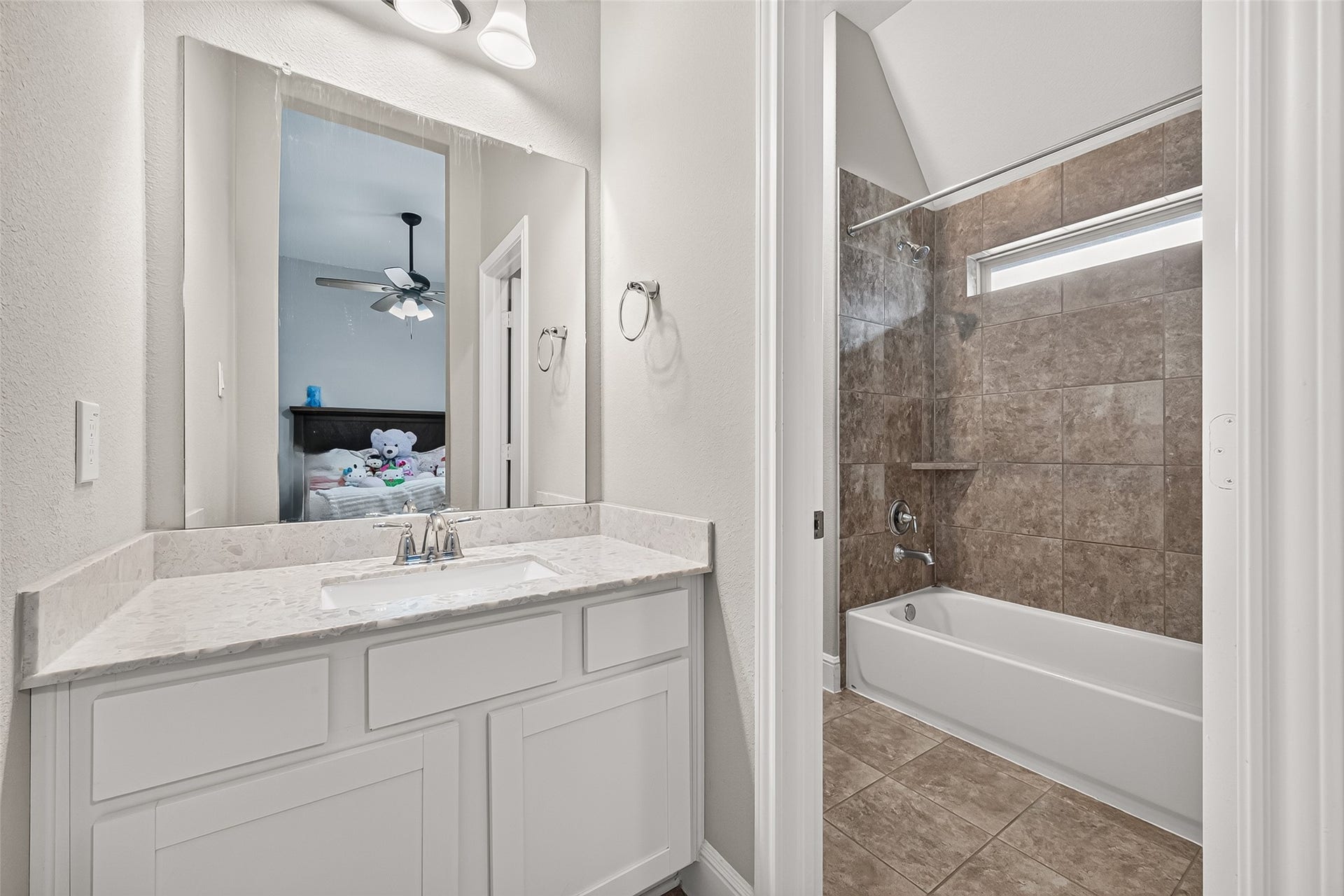 The other view of the bathroom shared by the two bedrooms.