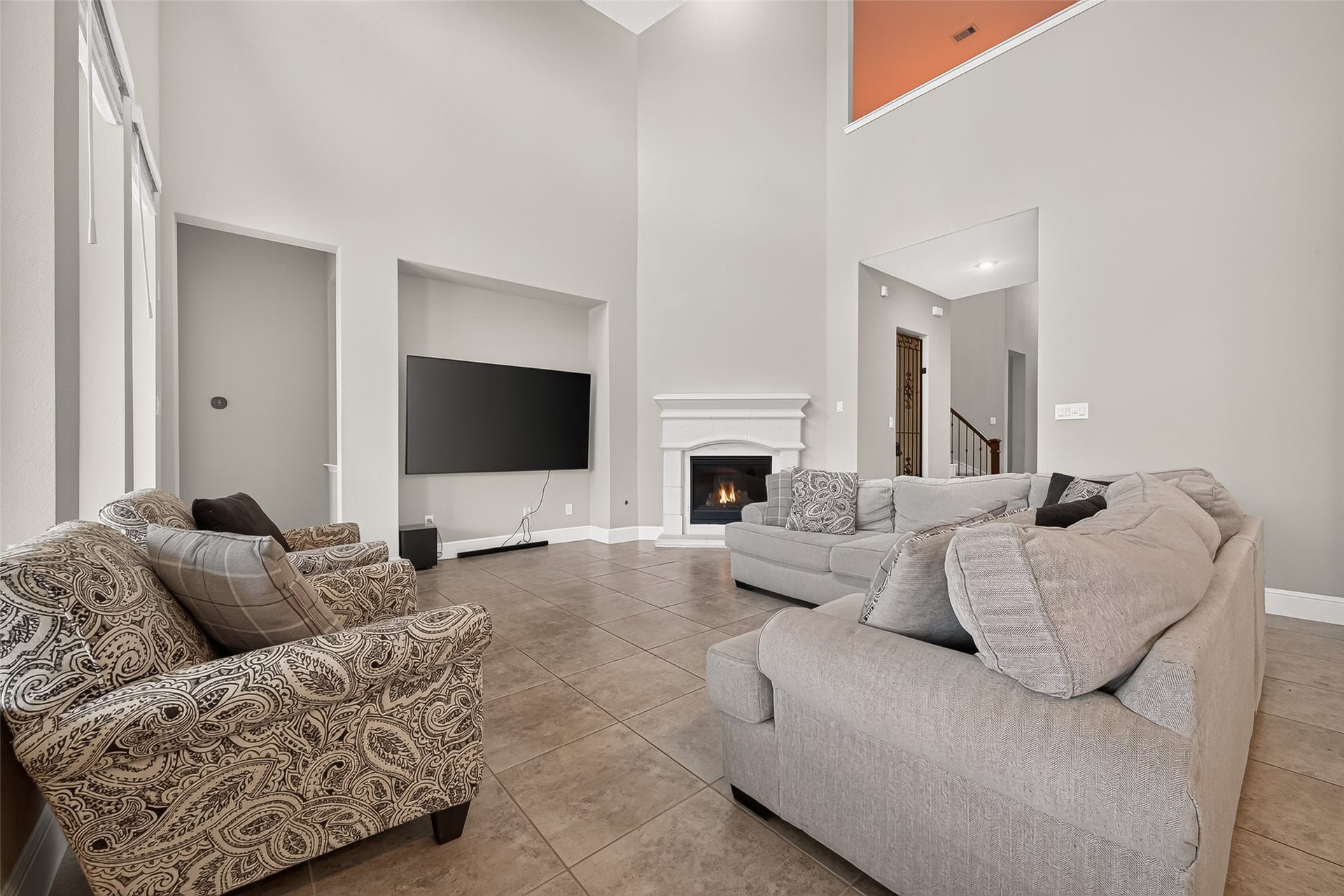 Living room has ample space to set up all of your furniture.