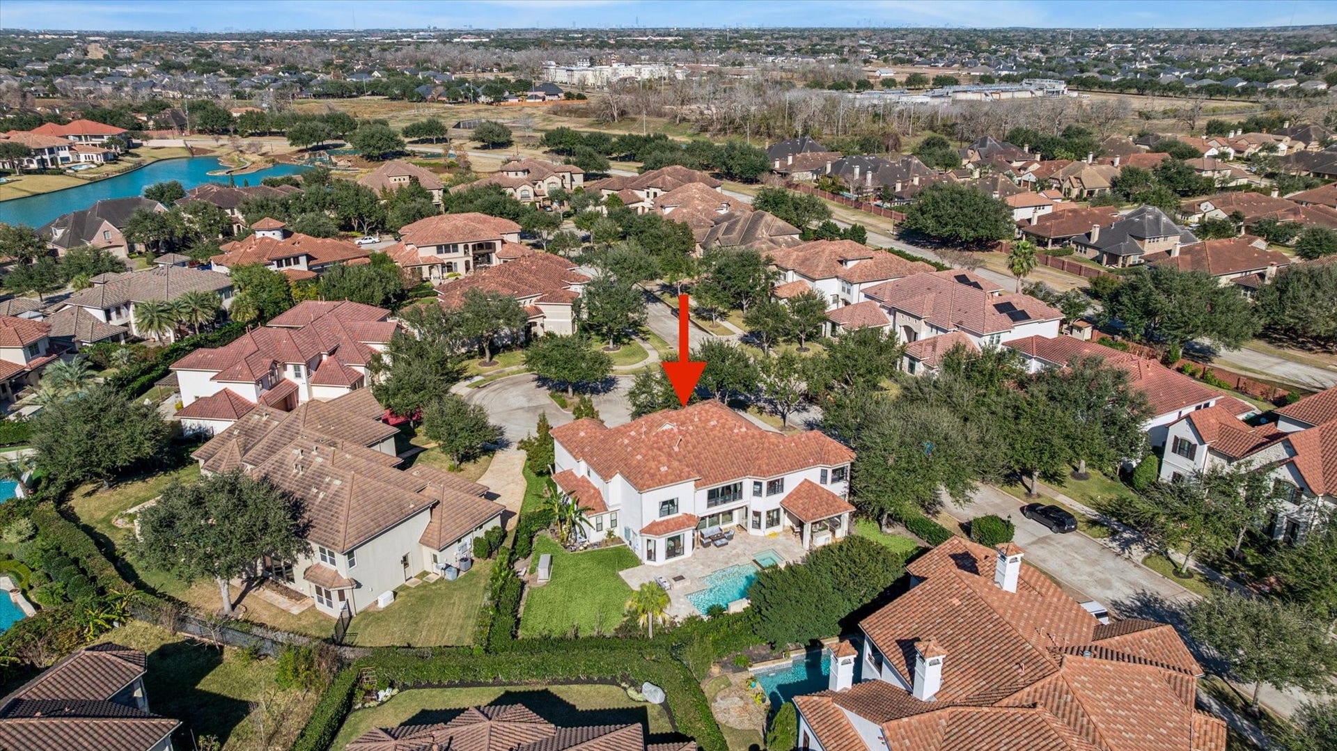 61 Open Sands Court, Sugar Land, TX 77479 This aerial photo showcases the beauty and luxury of Riverstone.