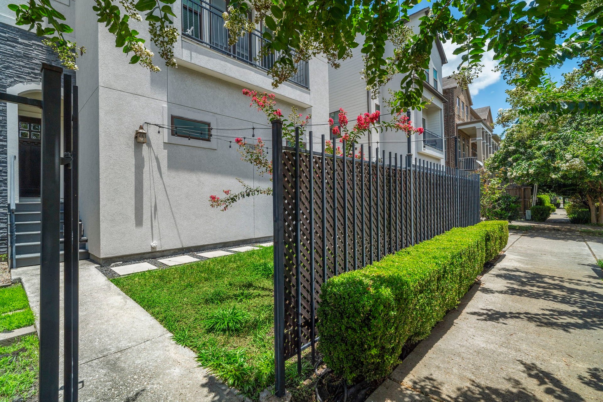 1629 W 23rd Street, Houston, TX 77008 Enjoy outdoor living on the gated front patio or second-floor balconyperfect for relaxing or entertaining.