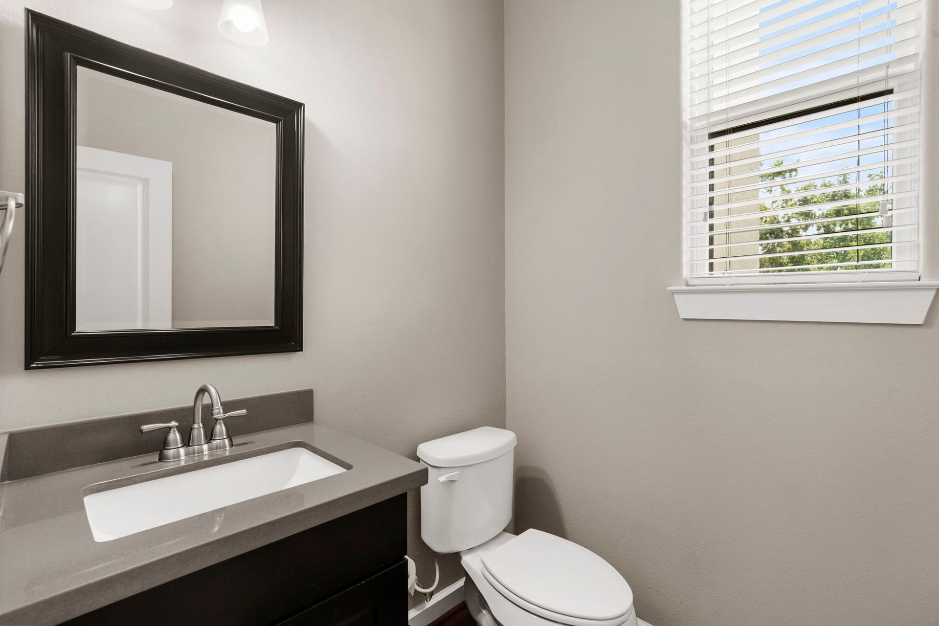 1629 W 23rd Street, Houston, TX 77008 A guest half-bathroom is situated just off the second-floor main living area, offering easy access for both residents and visitors.