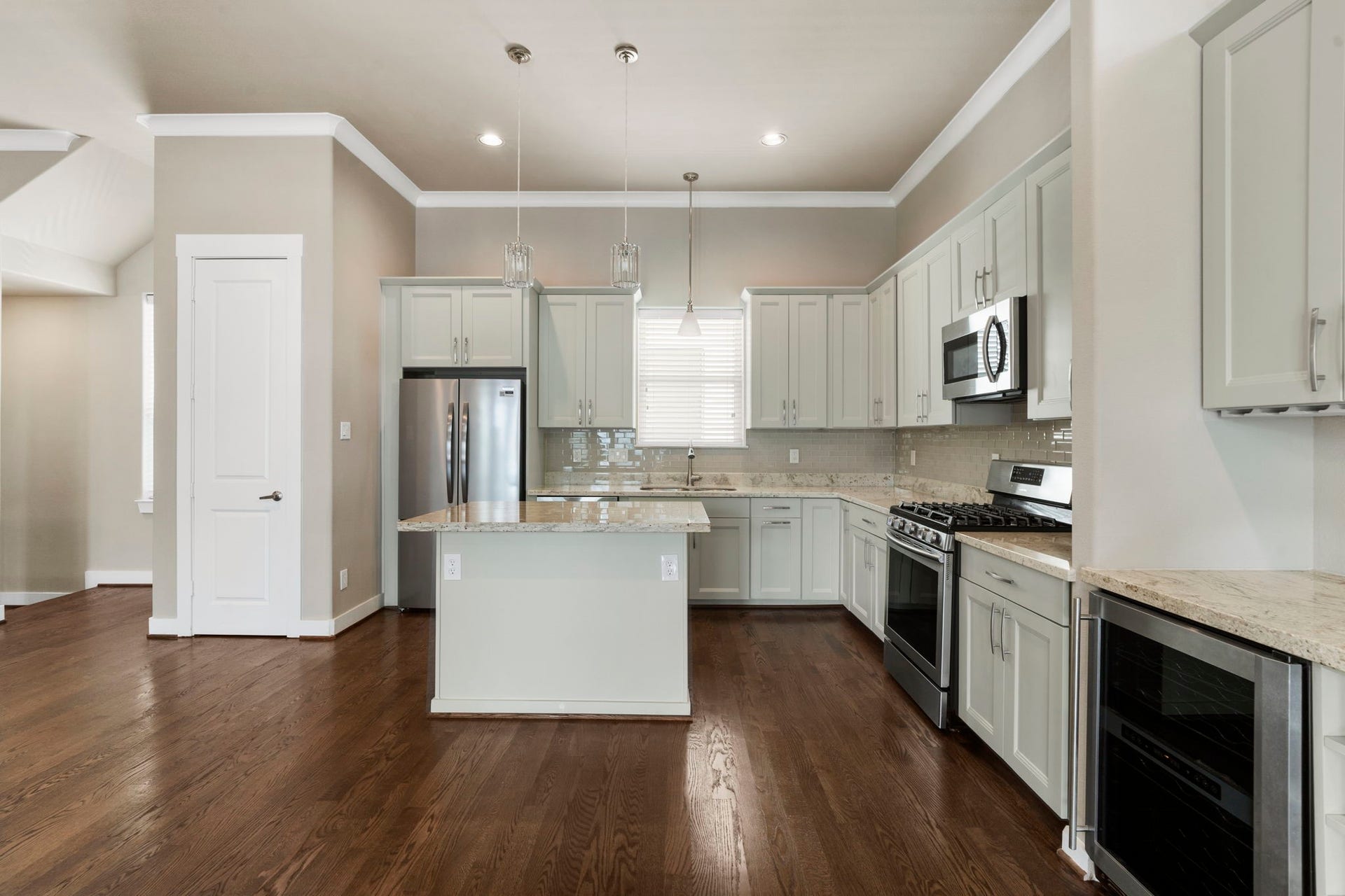 1629 W 23rd Street, Houston, TX 77008 A separate food pantry provides additional storage and keeps kitchen essentials organized and easily accessible.