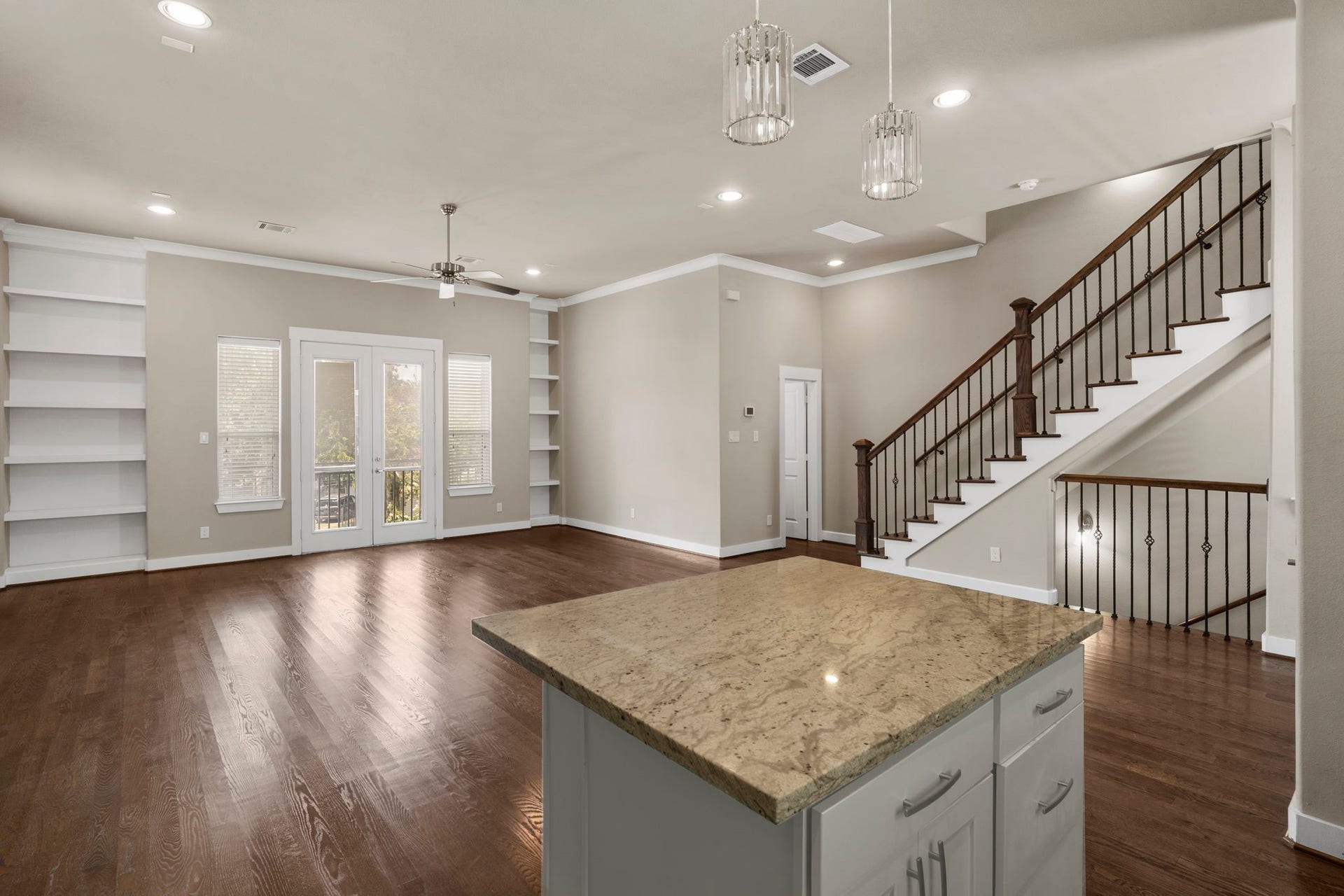 1629 W 23rd Street, Houston, TX 77008 The second floor is designed for entertaining, featuring an open-concept living, dining and kitchen area, along with a convenient half bath.