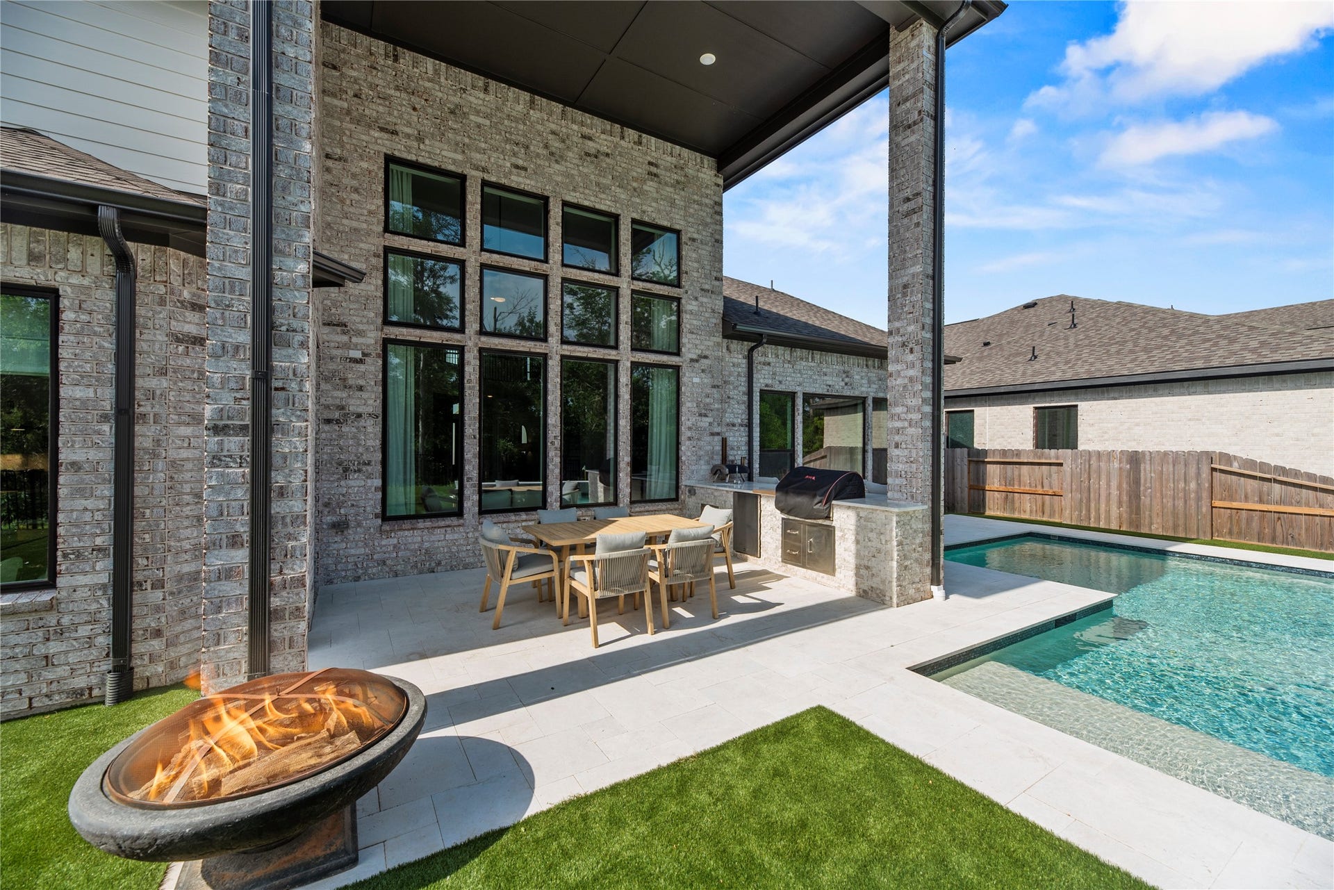 4439 Southpoint Way, Fulshear, TX 77441 Picture yourself entertaining in this space or just relaxing by the pool.