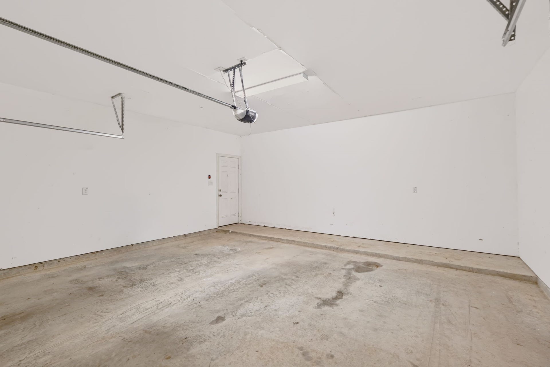 1642 Pultar Road, Richmond, TX 77469 Finished two car garage with automatic garage door opener.