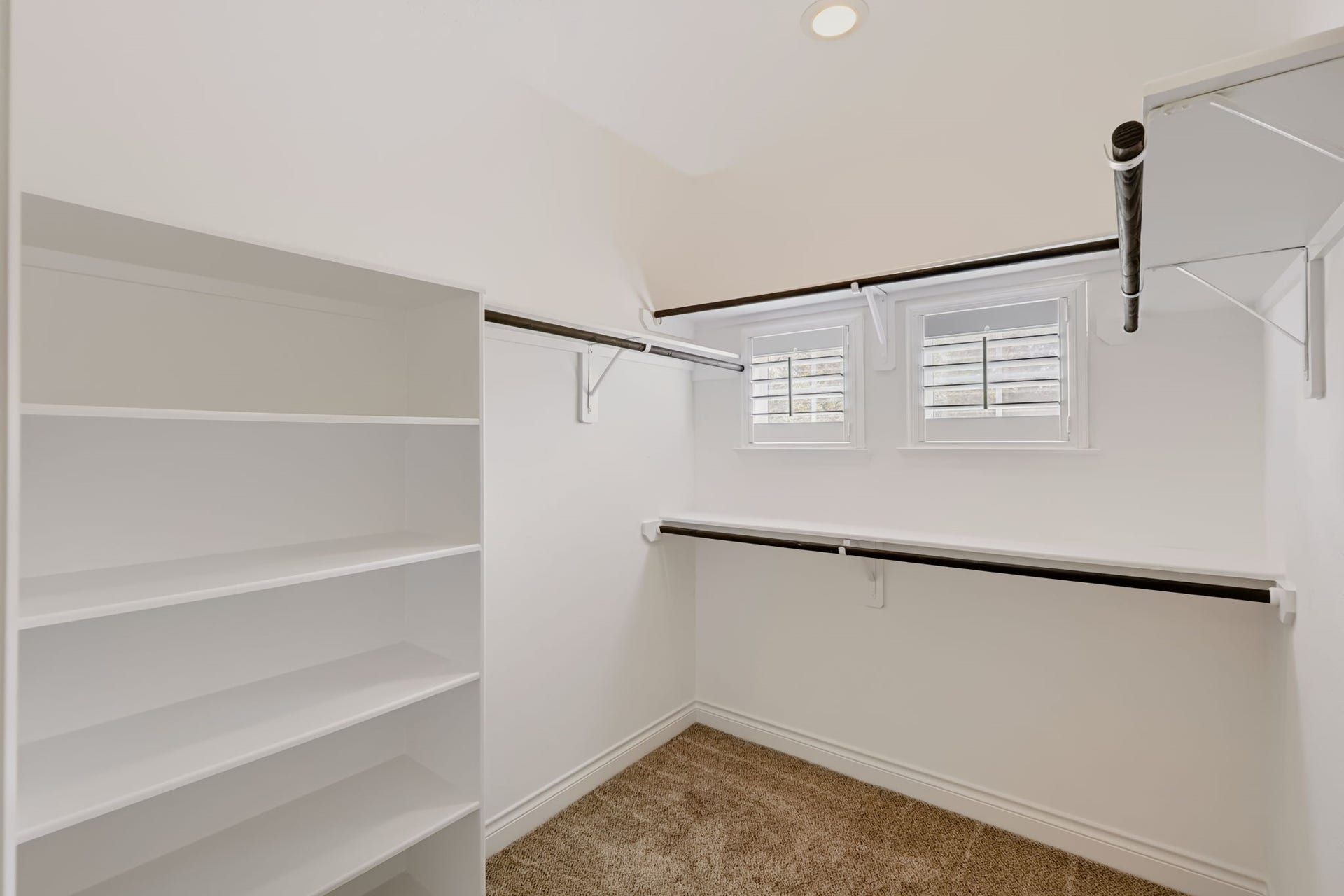 1642 Pultar Road, Richmond, TX 77469 One of two walk-in closets in the primary bath. This one has build in shelving.