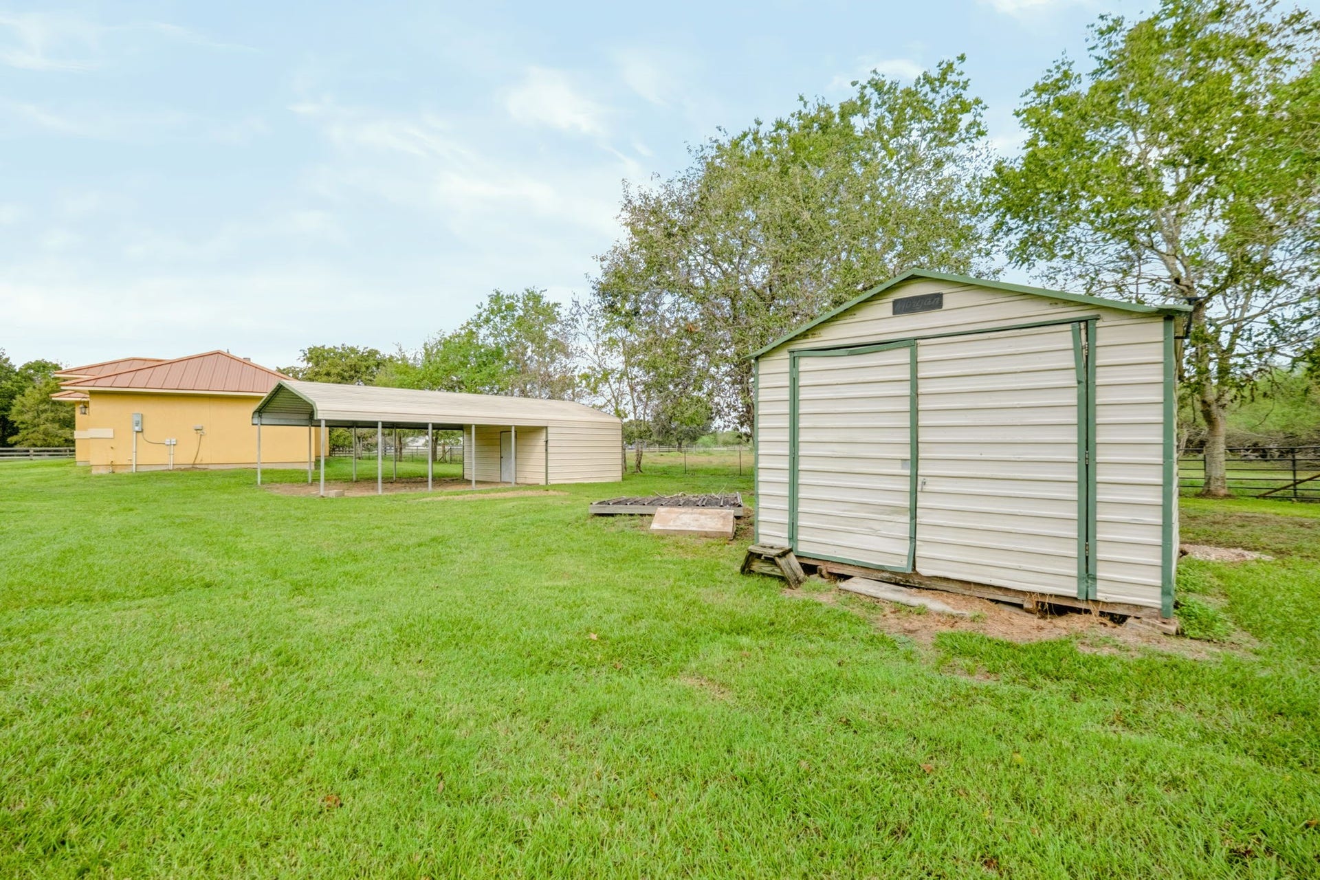 1642 Pultar Road, Richmond, TX 77469 In addition the carport, there is also a 12'x16' storage shed.
