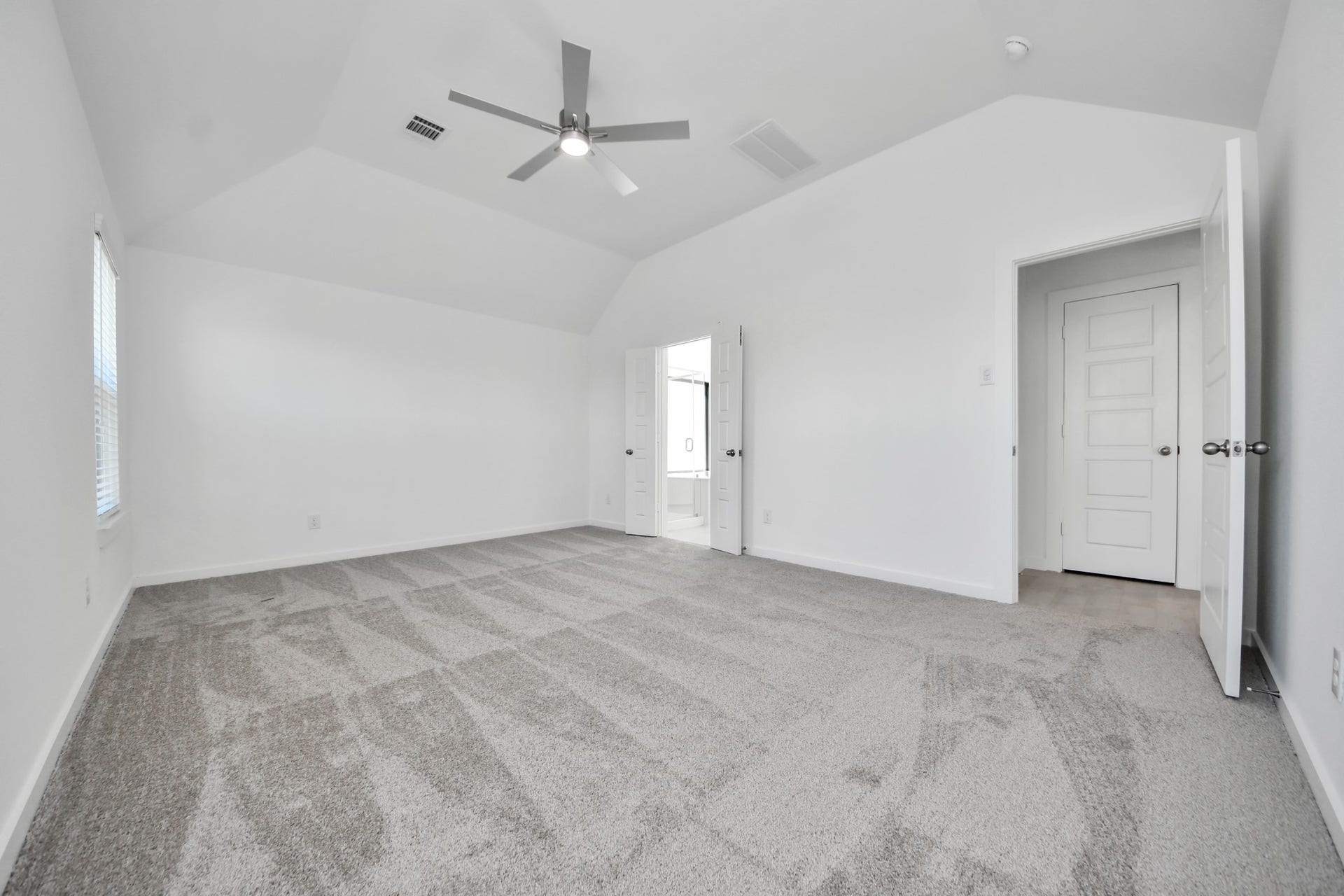 3068 Spoolwood Trail, Magnolia, TX 77355 Escape and relax in the exquisite primary suite, a haven to unwind after a long day.