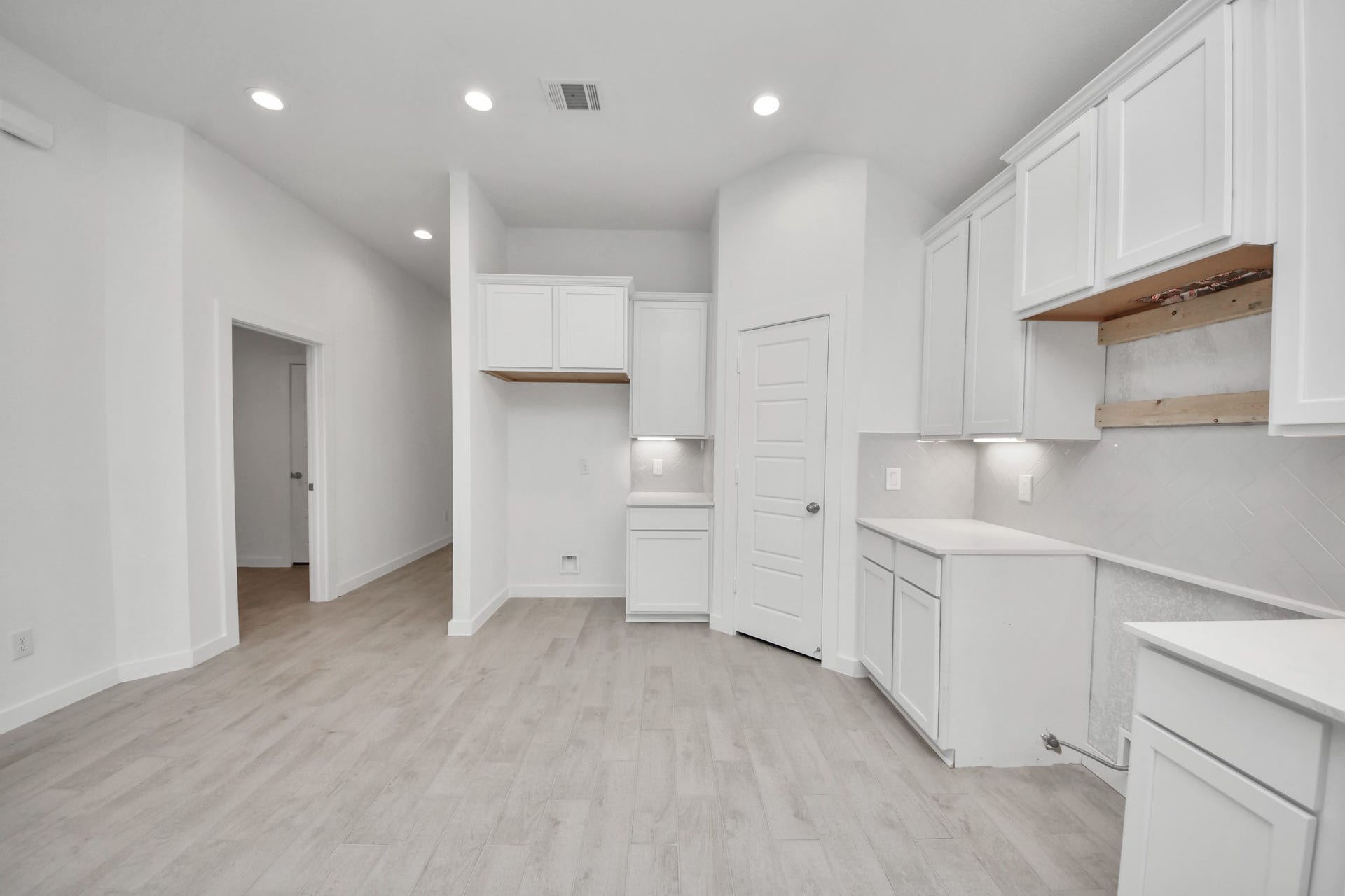3068 Spoolwood Trail, Magnolia, TX 77355 The open concept effortlessly connects the kitchen to the expansive family room, forming a perfect hub for gatherings. This seamless flow creates an inviting space where cooking and socializing come together harmoniously.
