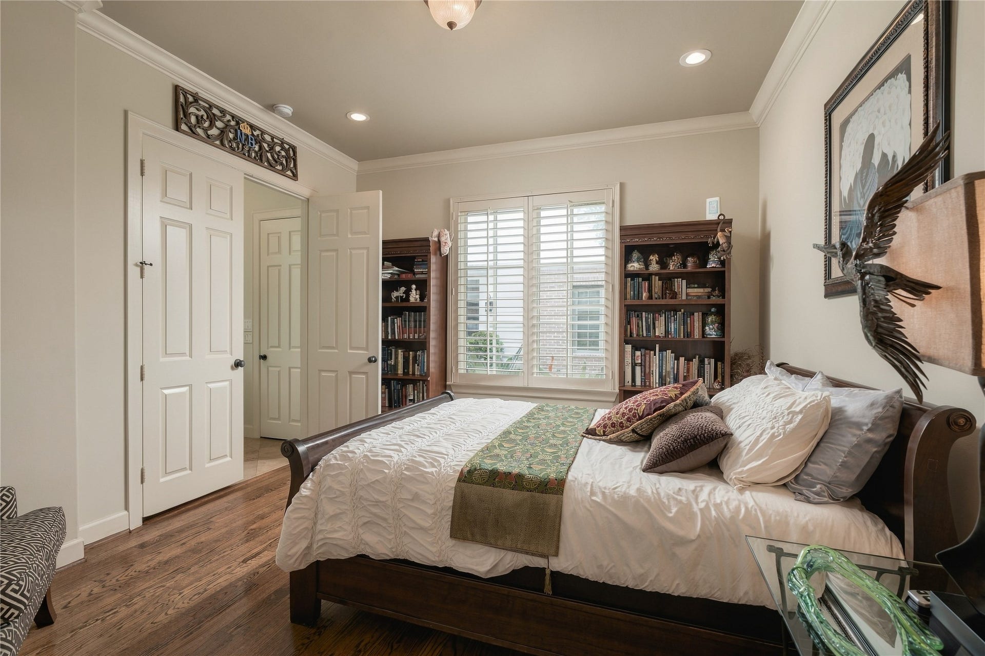 523 Lovett Boulevard, Houston, TX 77006 Comfortably proportioned and filled with natural light, the first-floor bedroom has enough room to settle in rather than simply serve as a place to sleep.