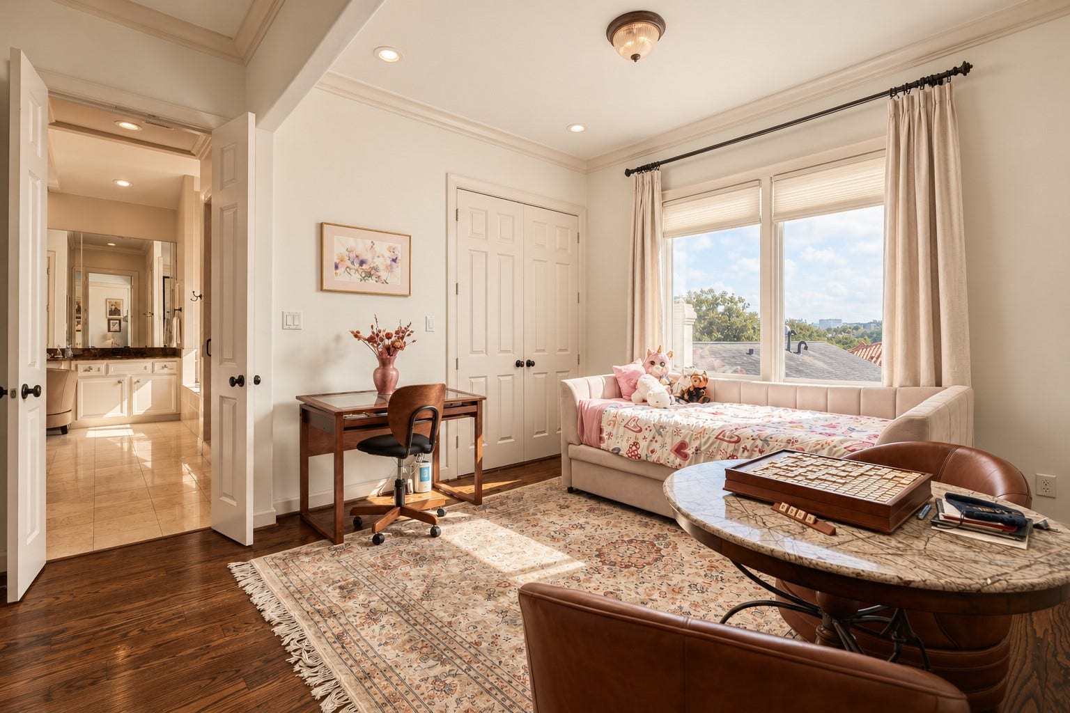523 Lovett Boulevard, Houston, TX 77006 The primary suite extends beyond the bedroom itself, with a flexible adjoining space that now houses the homes relocated laundry while still offering room for an office, dressing area or quiet sitting space. **Rendering of neutral wall color**