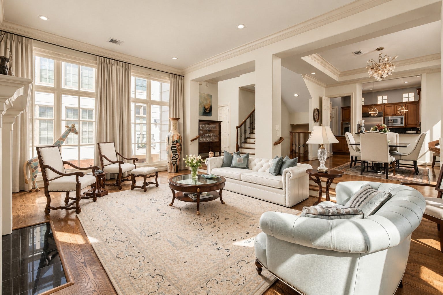 523 Lovett Boulevard, Houston, TX 77006 Turn around and the second floor begins to reveal how it all connects, with long sightlines carrying from the living room through dining and into the kitchen. **Rendering of neutral wall color**