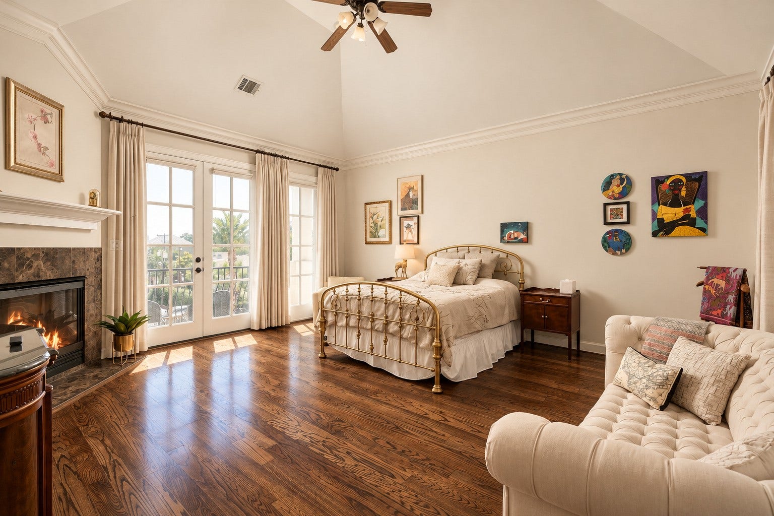 523 Lovett Boulevard, Houston, TX 77006 The primary suite feels almost like its own apartment, with a vaulted ceiling, fireplace, sitting area and French doors extending the room outdoors. **Rendering of neutral wall color**