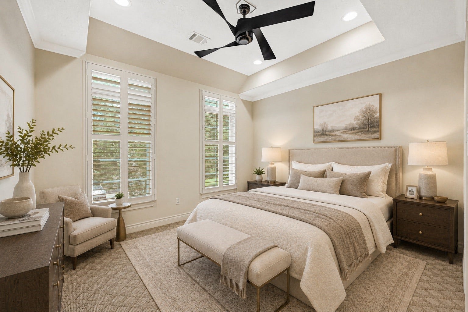 3 Waterford Pointe Circle, Sugar Land, TX 77479 Serene bedroom featuring elegant tray ceiling with fan, and abundant natural light from large windows with plantation shutters.