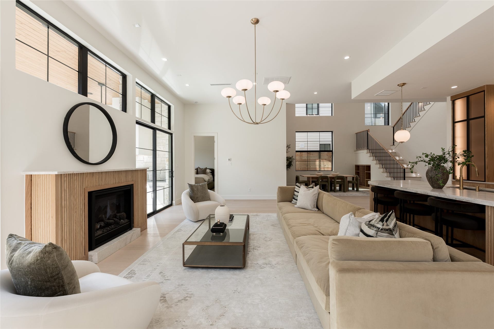 1109 Voight Street, Houston, TX 77009 The great room brings the homes architecture into one frame, with 12 foot ceilings, a statement fireplace and an open connection to the kitchen and dramatic two story dining room beyond.