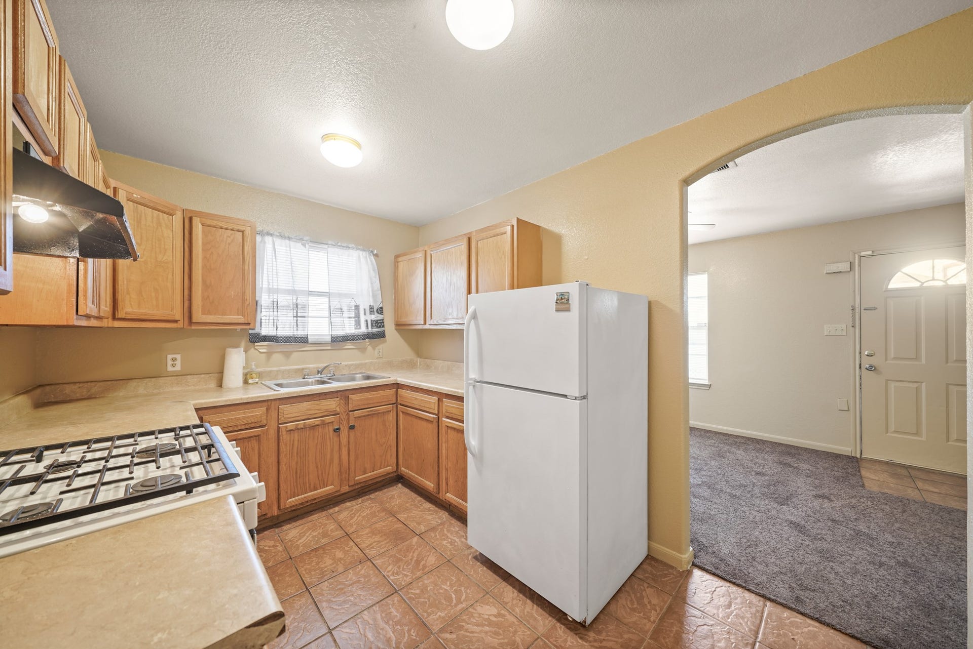 Unit A Kitchen with view towards Living Area in rear