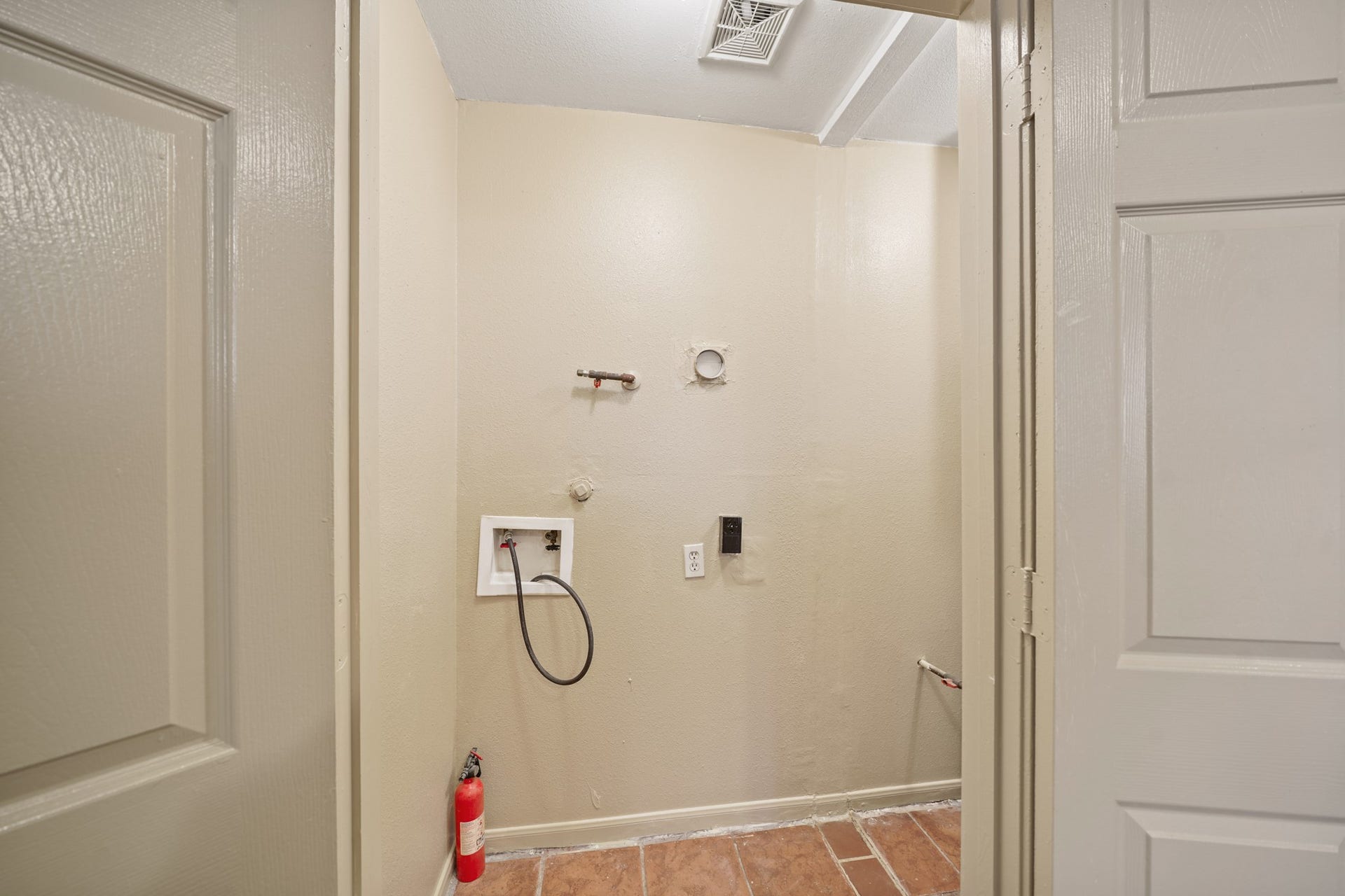 Unit A Utility Room for full size washer/dryer