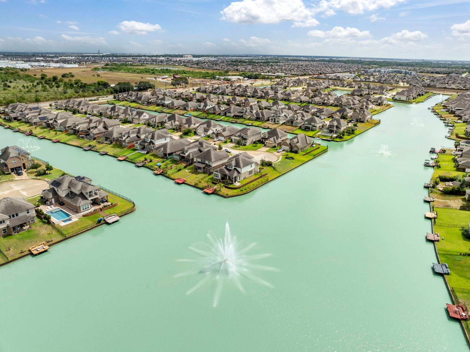 24030 Cannon Anello Court, Katy, TX 77493 Imagine relaxing on the lake in your backyard!