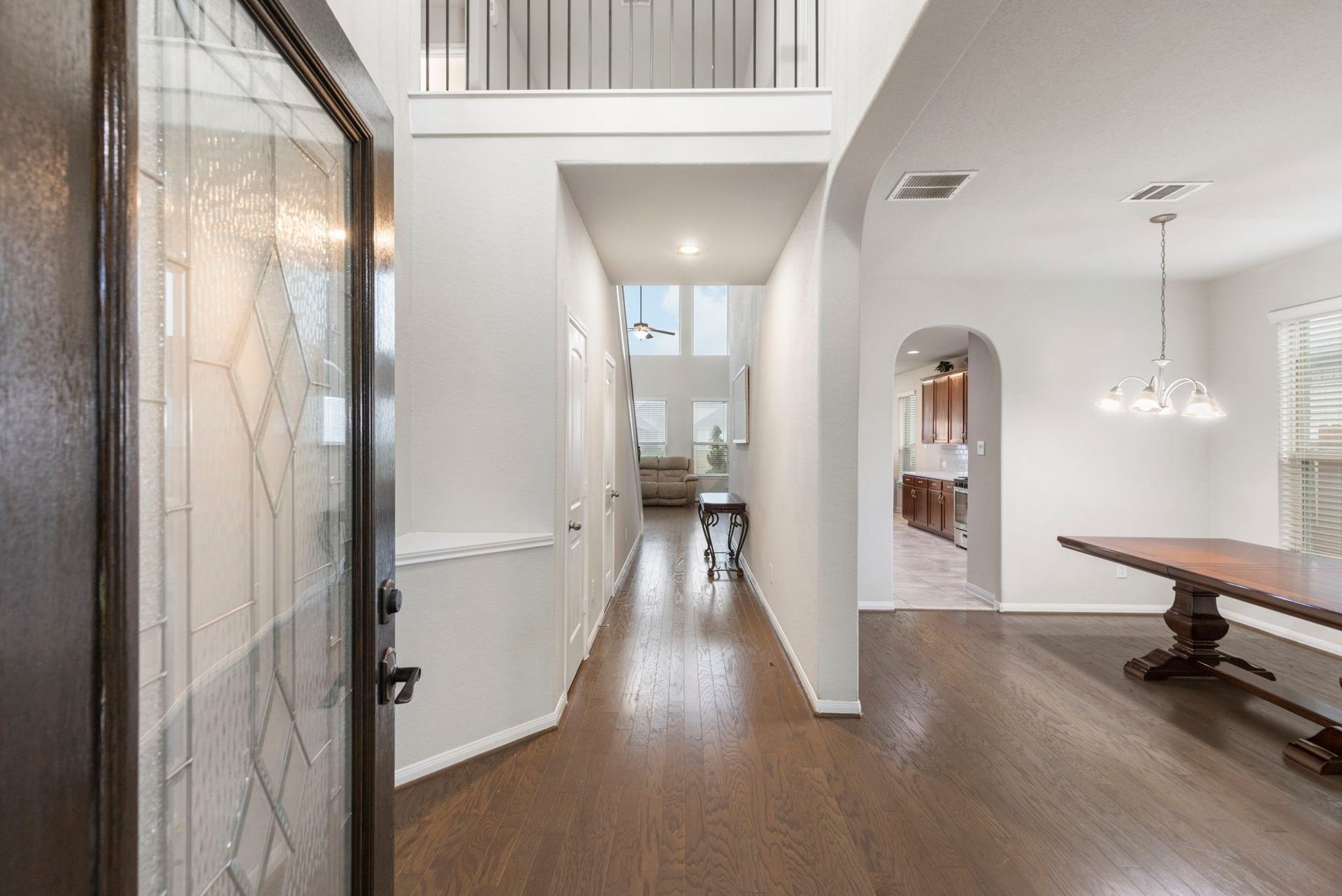 24030 Cannon Anello Court, Katy, TX 77493 Upon entering notice the soaring ceilings and no carpet throughout the main living areas. The formal dining/den are to the right of the entrance.