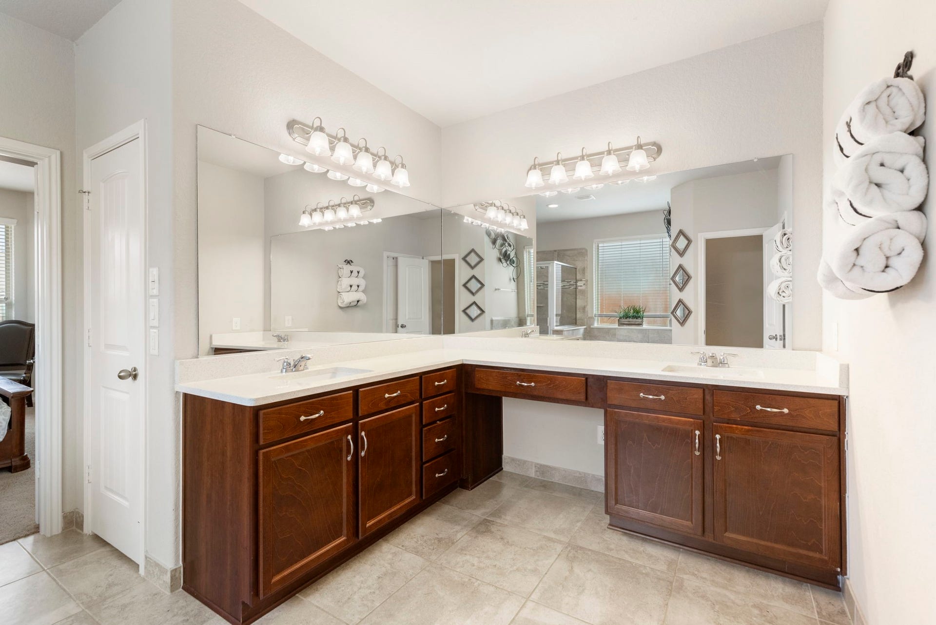 24030 Cannon Anello Court, Katy, TX 77493 Double sinks and a vanity make getting ready a breeze in the morning.