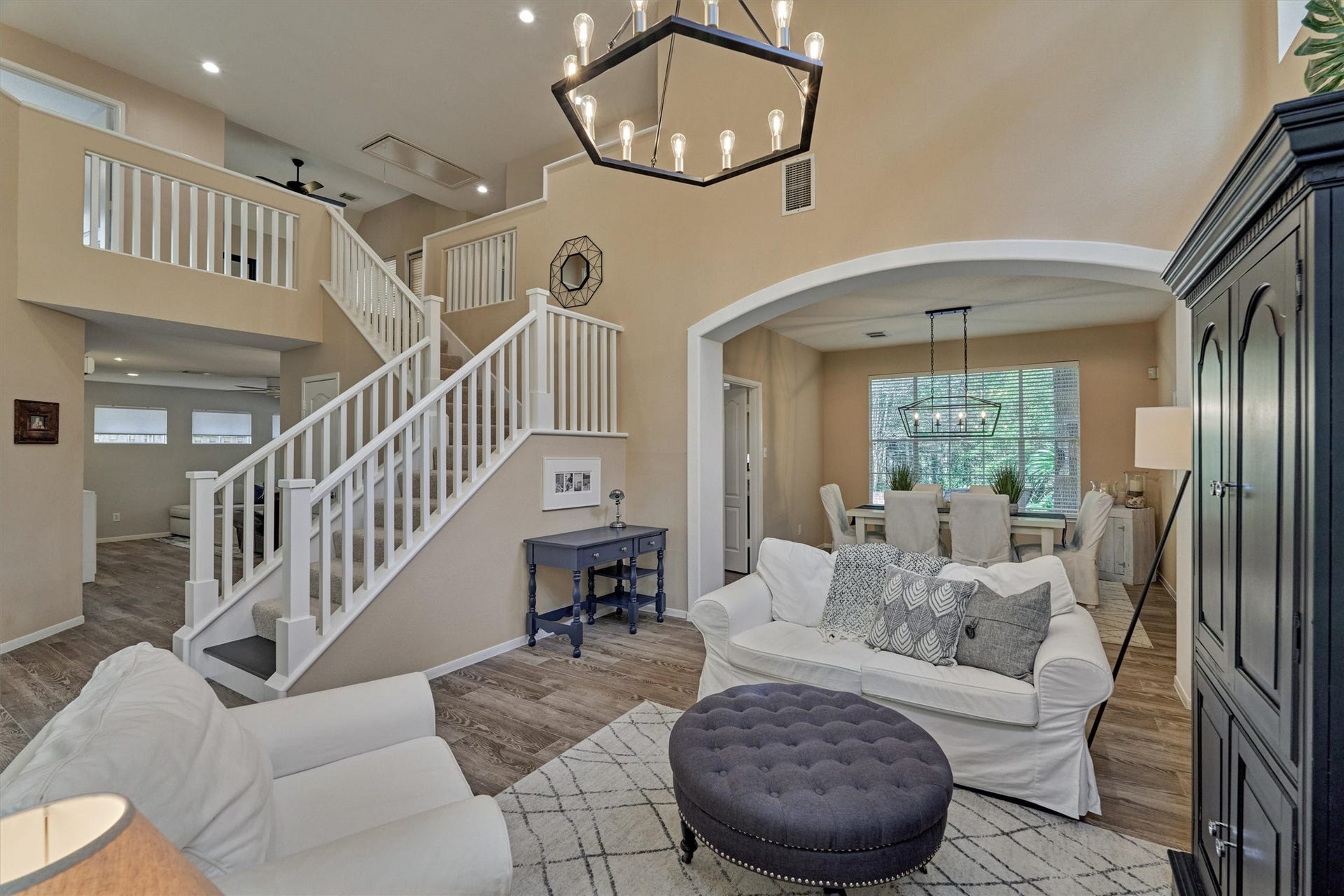 This view of the living room highlights the seamless flow and thoughtful functionality of the home's floor plan!