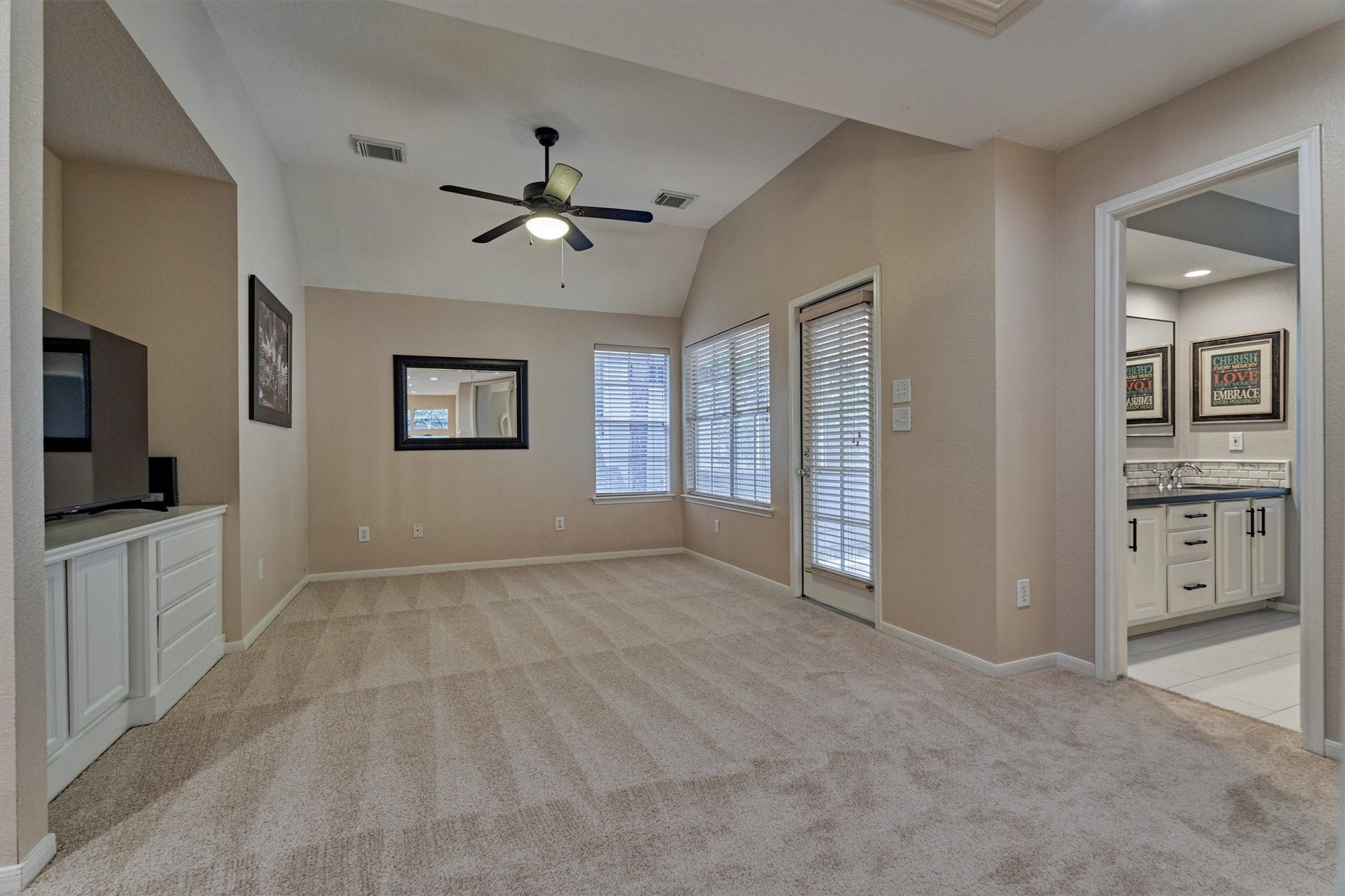 Spacious upstairs game room offers versatile flex space and direct access to the screened-in balcony!