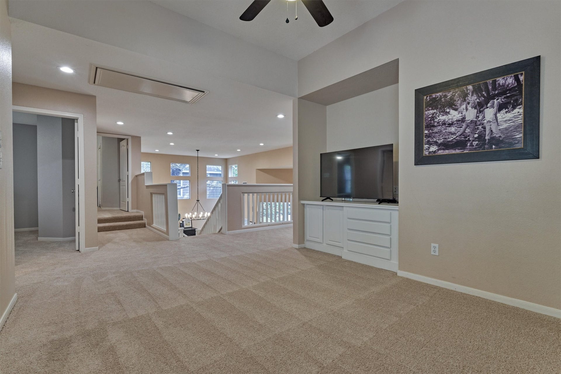 Endless possibilities await in this versatile game room, perfect for a playroom, upstairs lounge, media space, or whatever best suits your lifestyle!