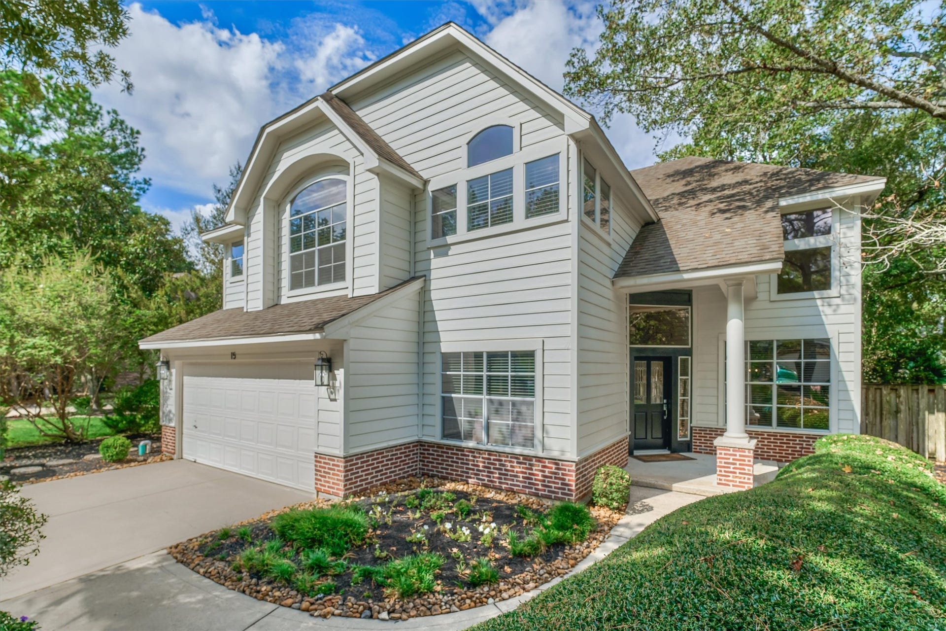 A charming front walkway welcomes you to this gorgeous 4-bedroom floorplan with superior flow & function, including versatile living area on the main level, and so many updates throughout! Come take a look!