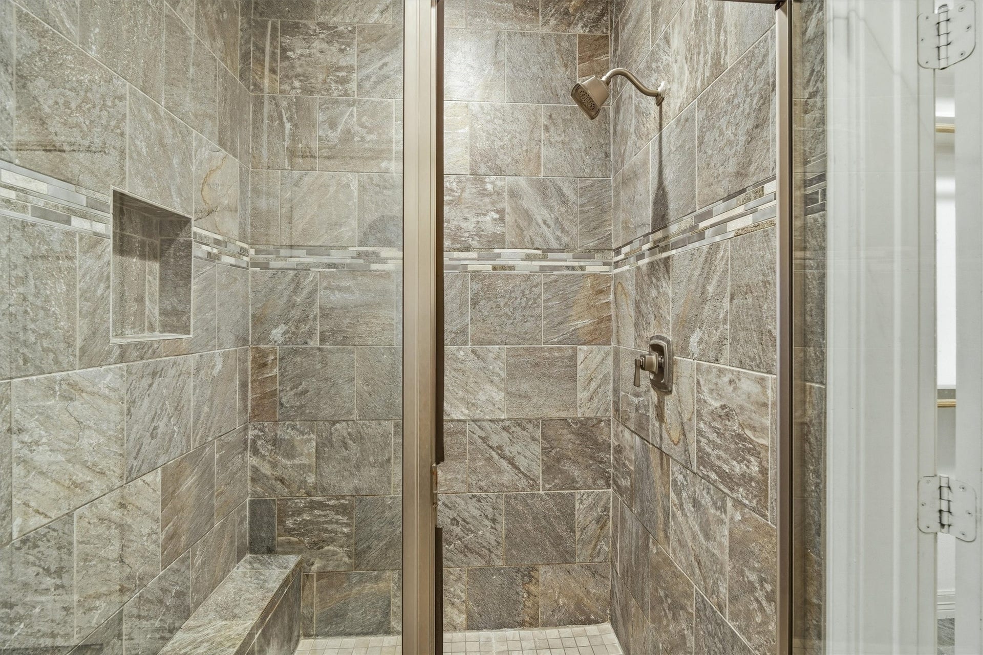 437 Pompano Street, Bayou Vista, TX 77563 The custom tiled, over sized shower with detail work is a perfect way to wind down after a day fishing on your boat